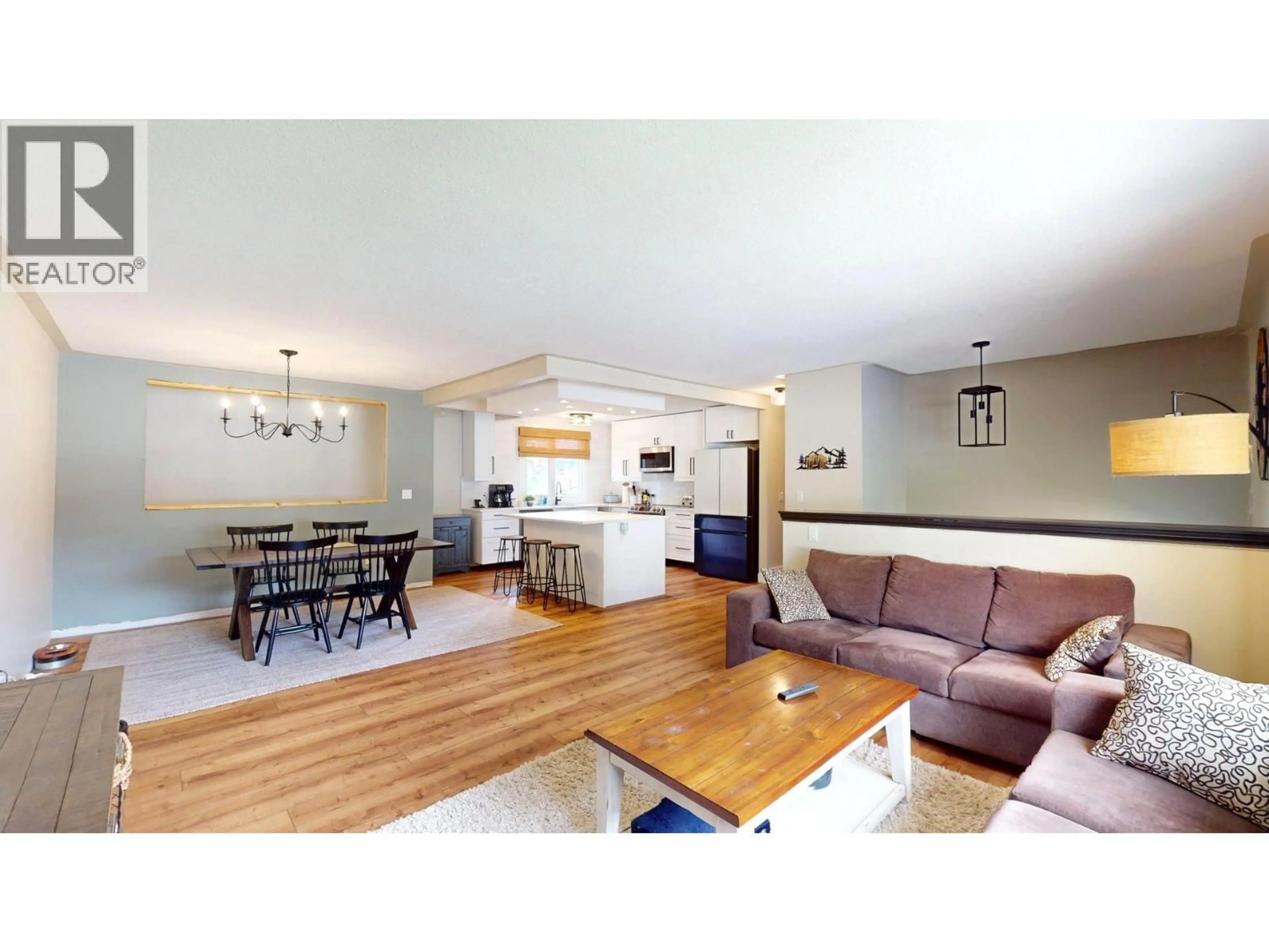 Open concept kitchen, wood/laminate floor for 1162 NASHTON CRESCENT, Elkford British Columbia V0B1H0