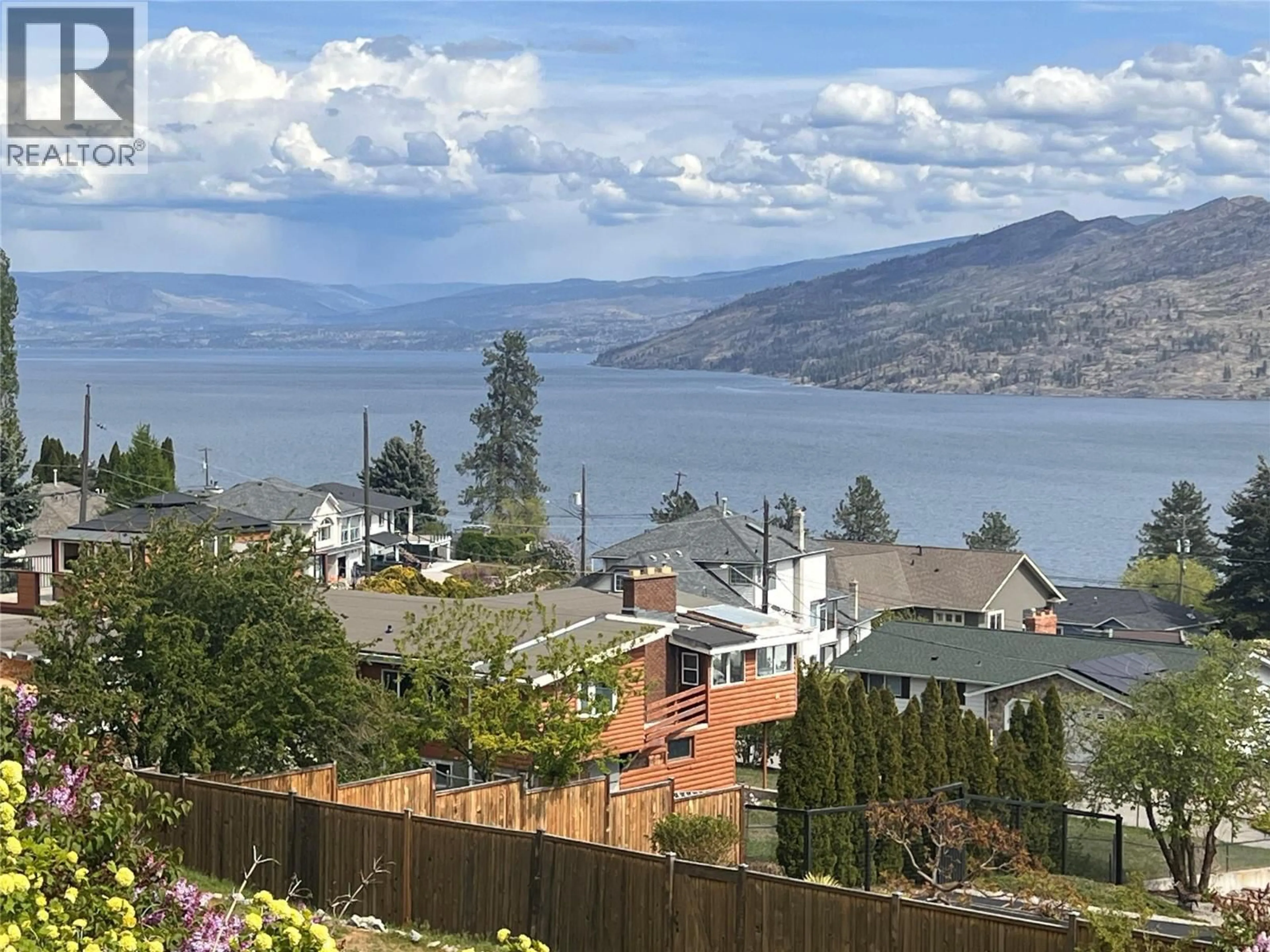 A pic from outside/outdoor area/front of a property/back of a property/a pic from drone, water/lake/river/ocean view for 6119 WILSON ROAD, Peachland British Columbia V0H1X7