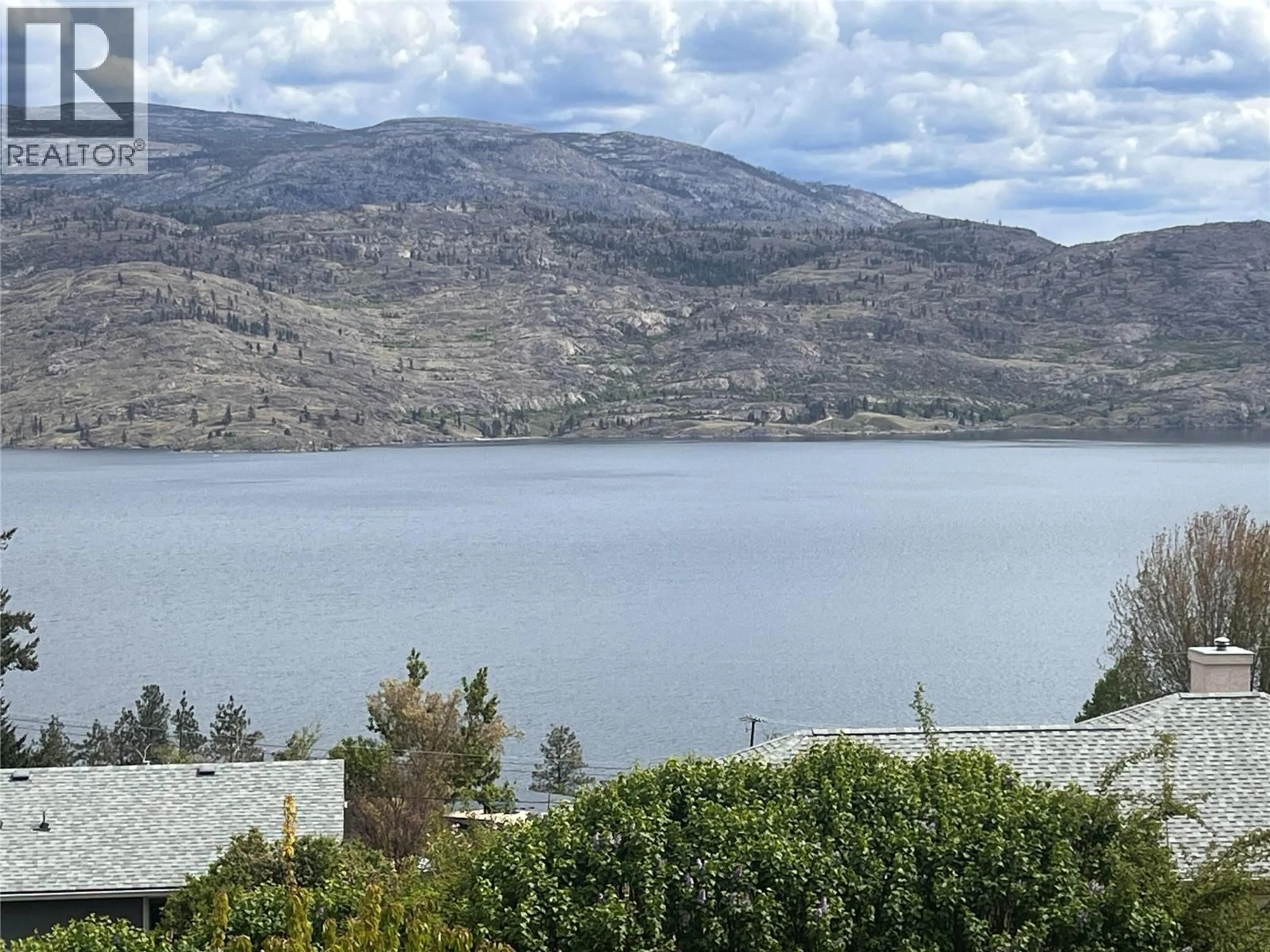 A pic from outside/outdoor area/front of a property/back of a property/a pic from drone, water/lake/river/ocean view for 6119 WILSON ROAD, Peachland British Columbia V0H1X7