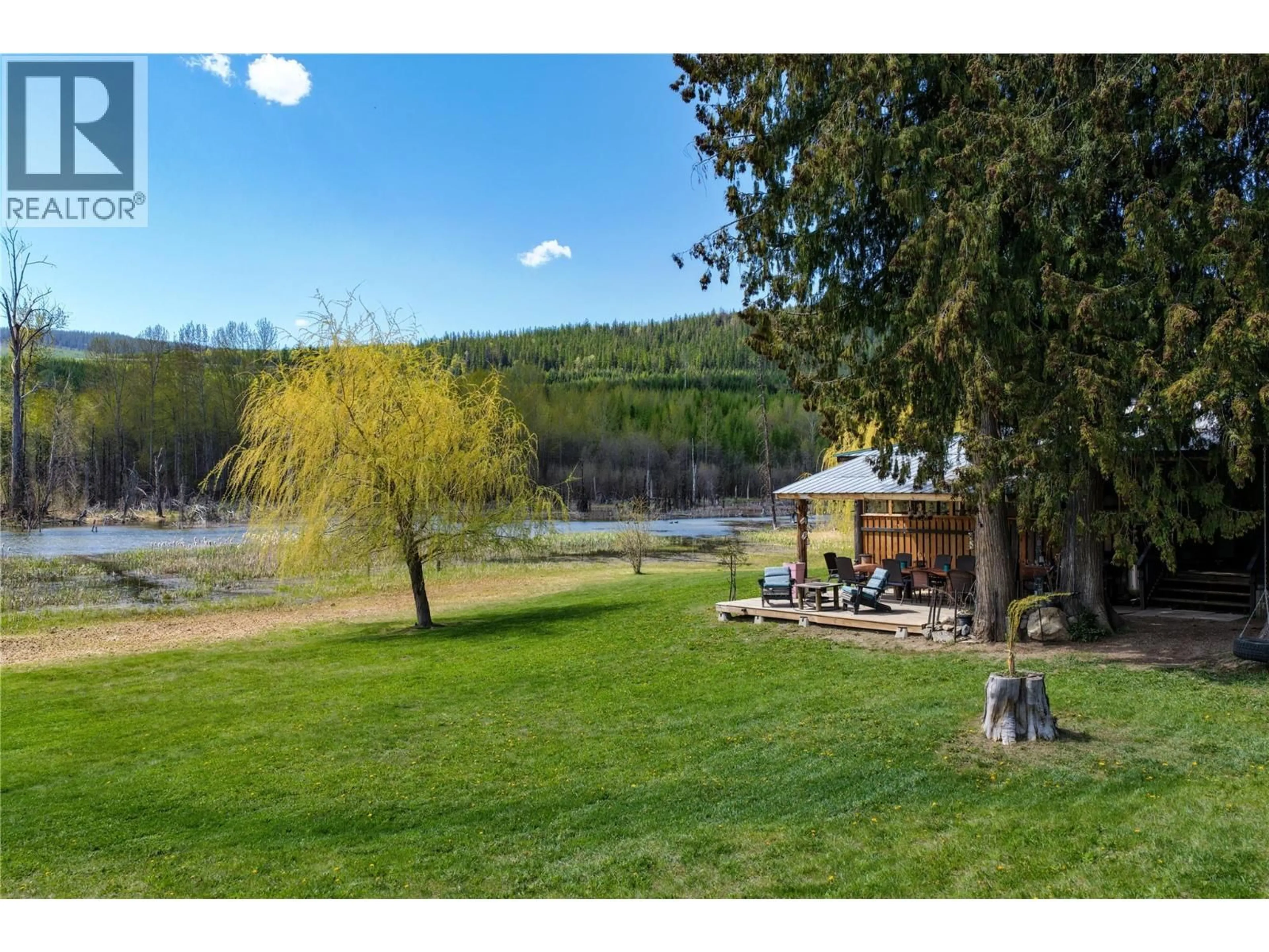 A pic from outside/outdoor area/front of a property/back of a property/a pic from drone, water/lake/river/ocean view for 650 TRINITY VALLEY ROAD, Lumby British Columbia V0E2G4