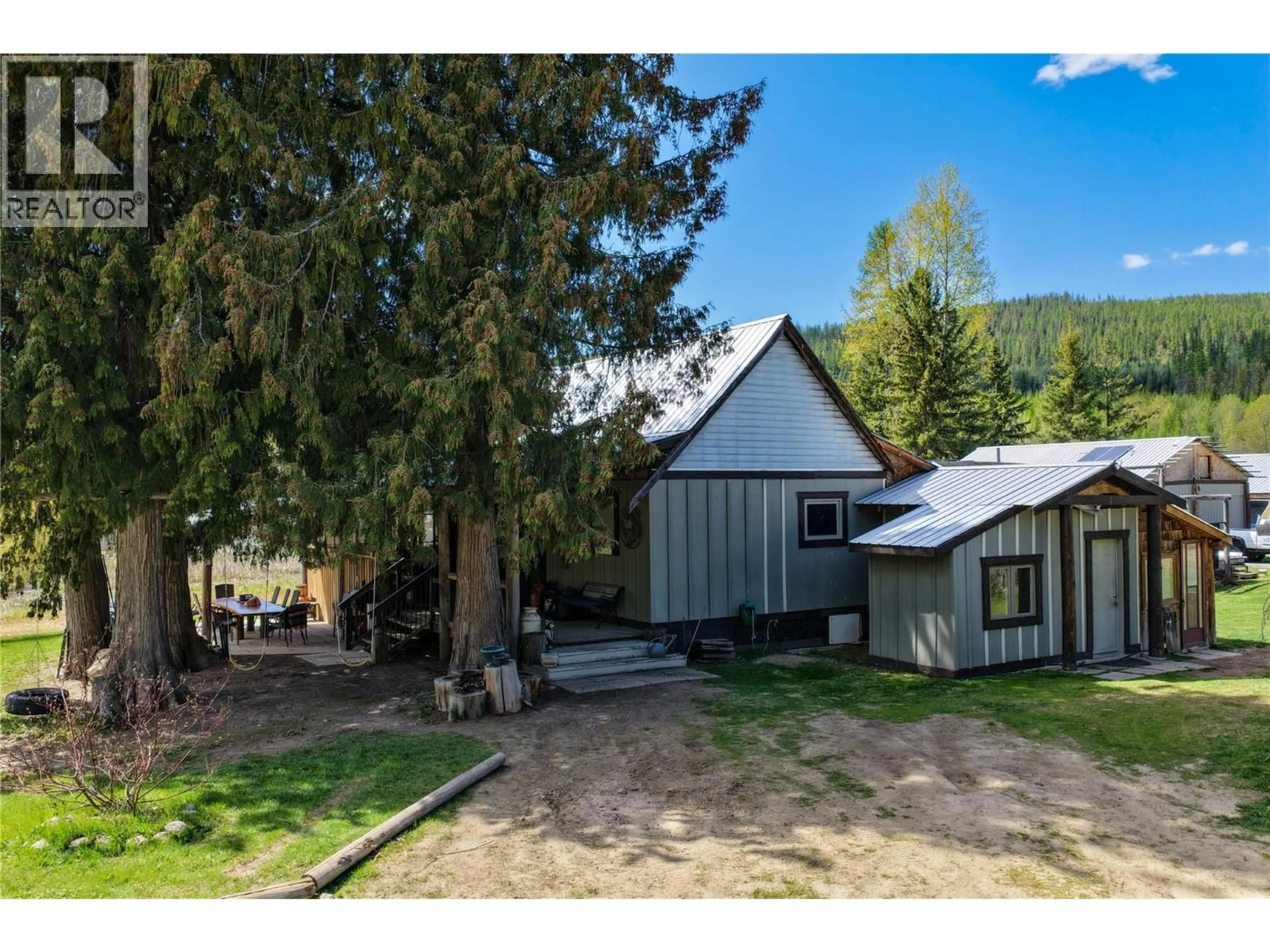 A pic from outside/outdoor area/front of a property/back of a property/a pic from drone, mountain view for 650 TRINITY VALLEY ROAD, Lumby British Columbia V0E2G4