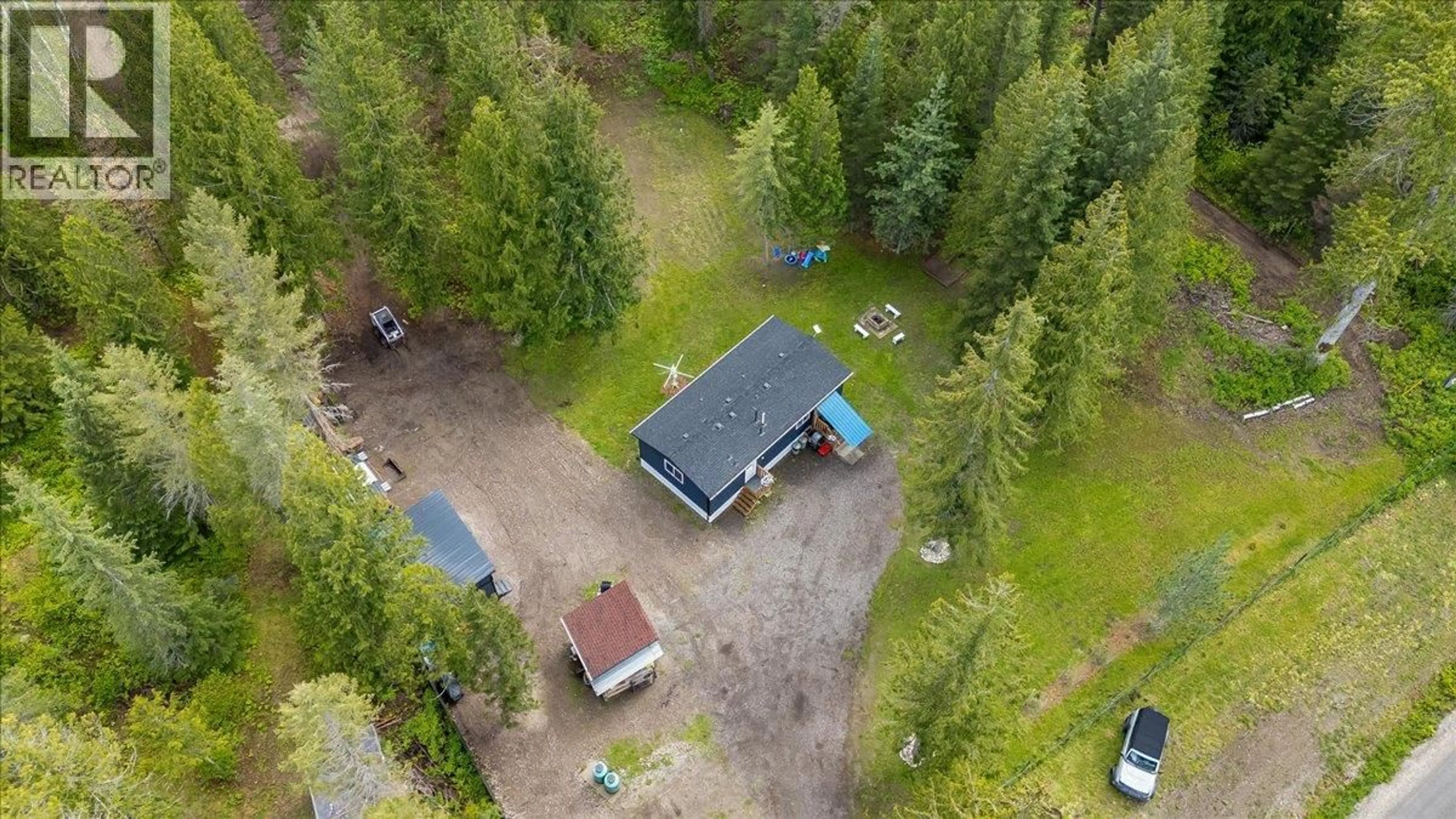 A pic from outside/outdoor area/front of a property/back of a property/a pic from drone, forest/trees view for 118 LINESS ROAD, Salmo British Columbia V0G1Z0
