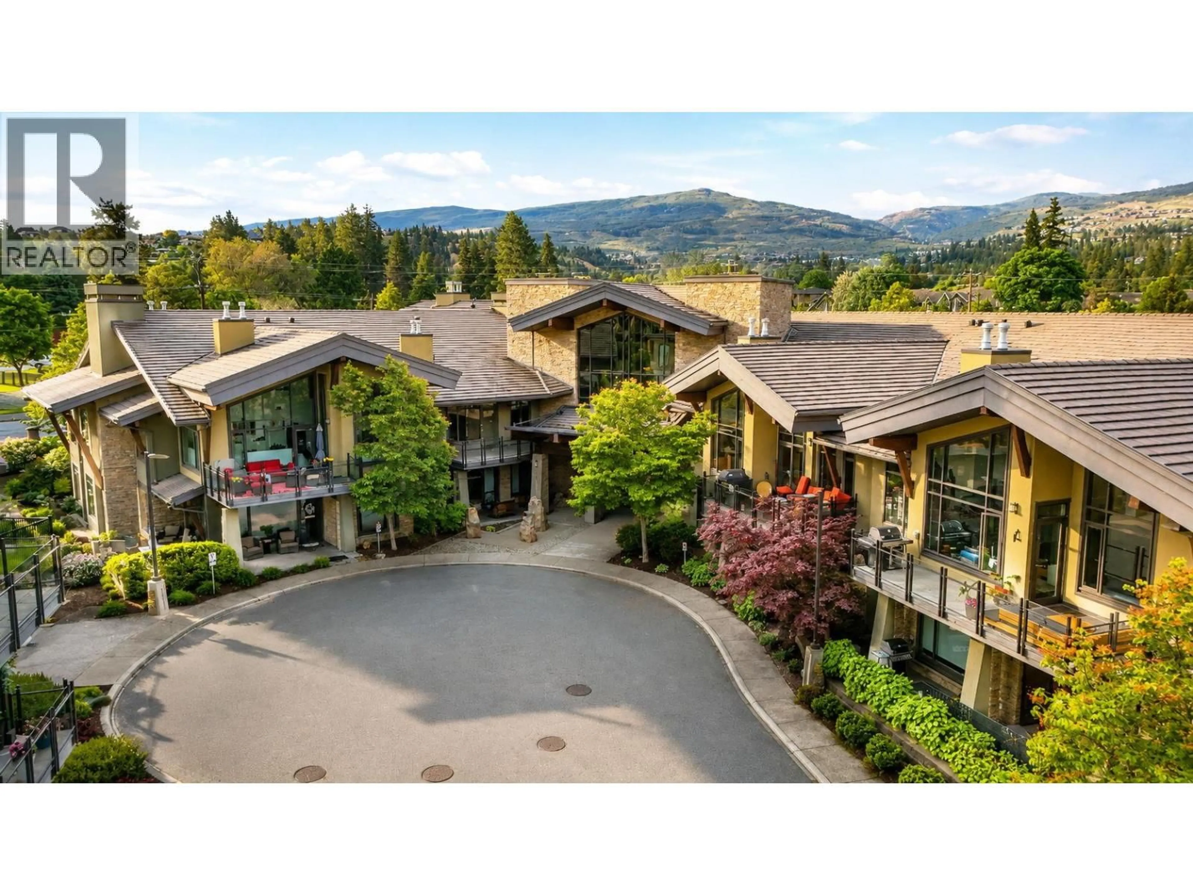 A pic from outside/outdoor area/front of a property/back of a property/a pic from drone, mountain view for 116 - 600 SARSONS ROAD, Kelowna British Columbia V1W5H5