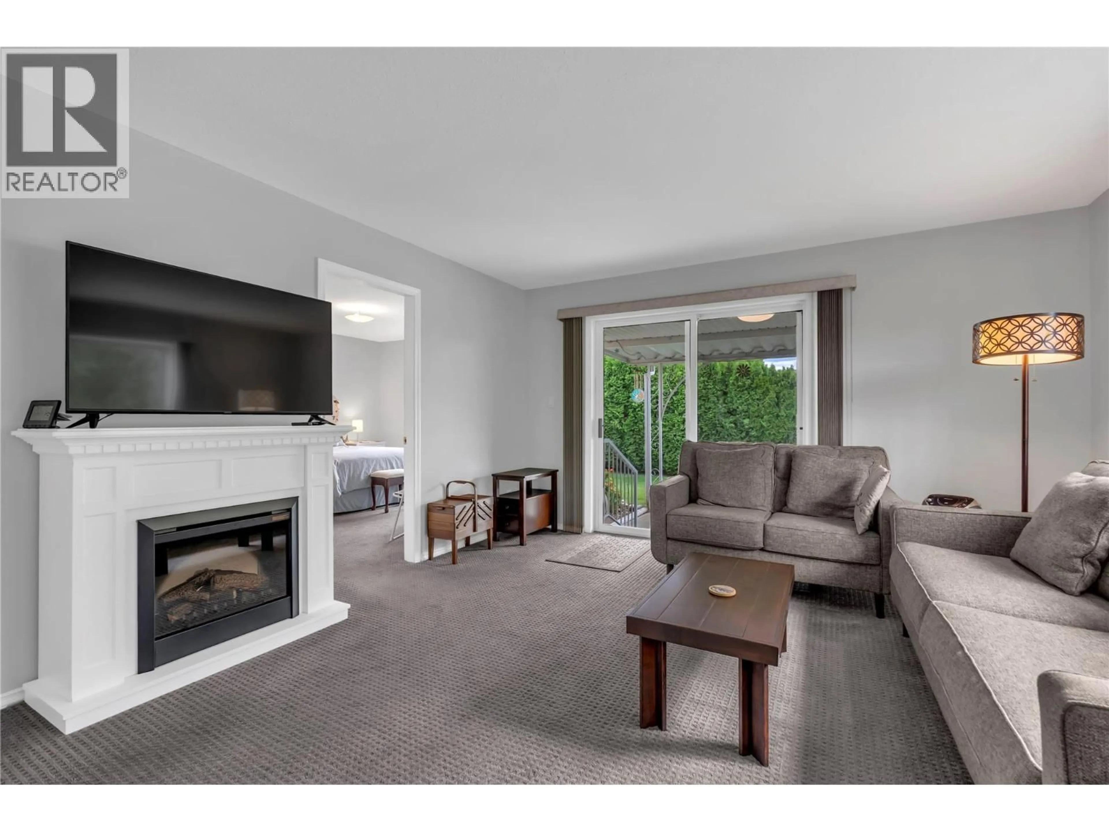 Living room with furniture, unknown for 8 - 145 REDWING PLACE, Oliver British Columbia V0H1T4