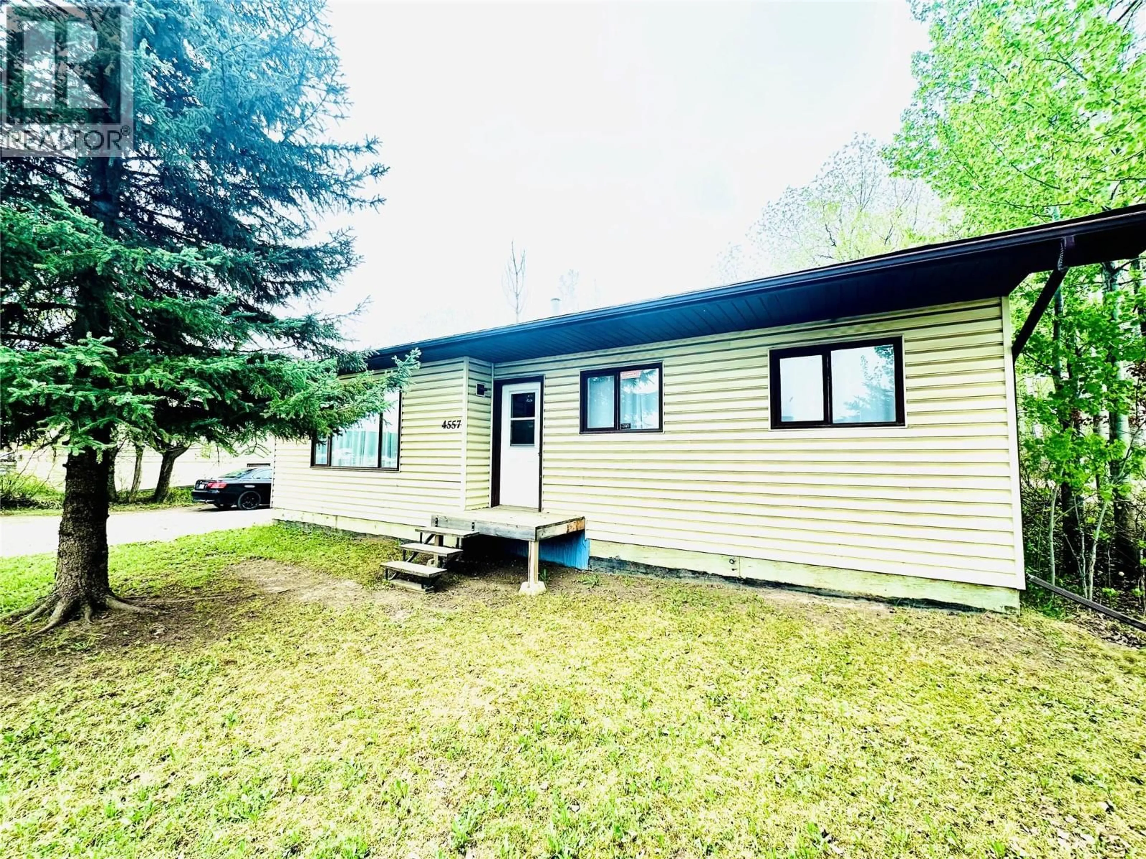 A pic from outside/outdoor area/front of a property/back of a property/a pic from drone, street for 4557 VETERANS WAY, Chetwynd British Columbia V0C1J0
