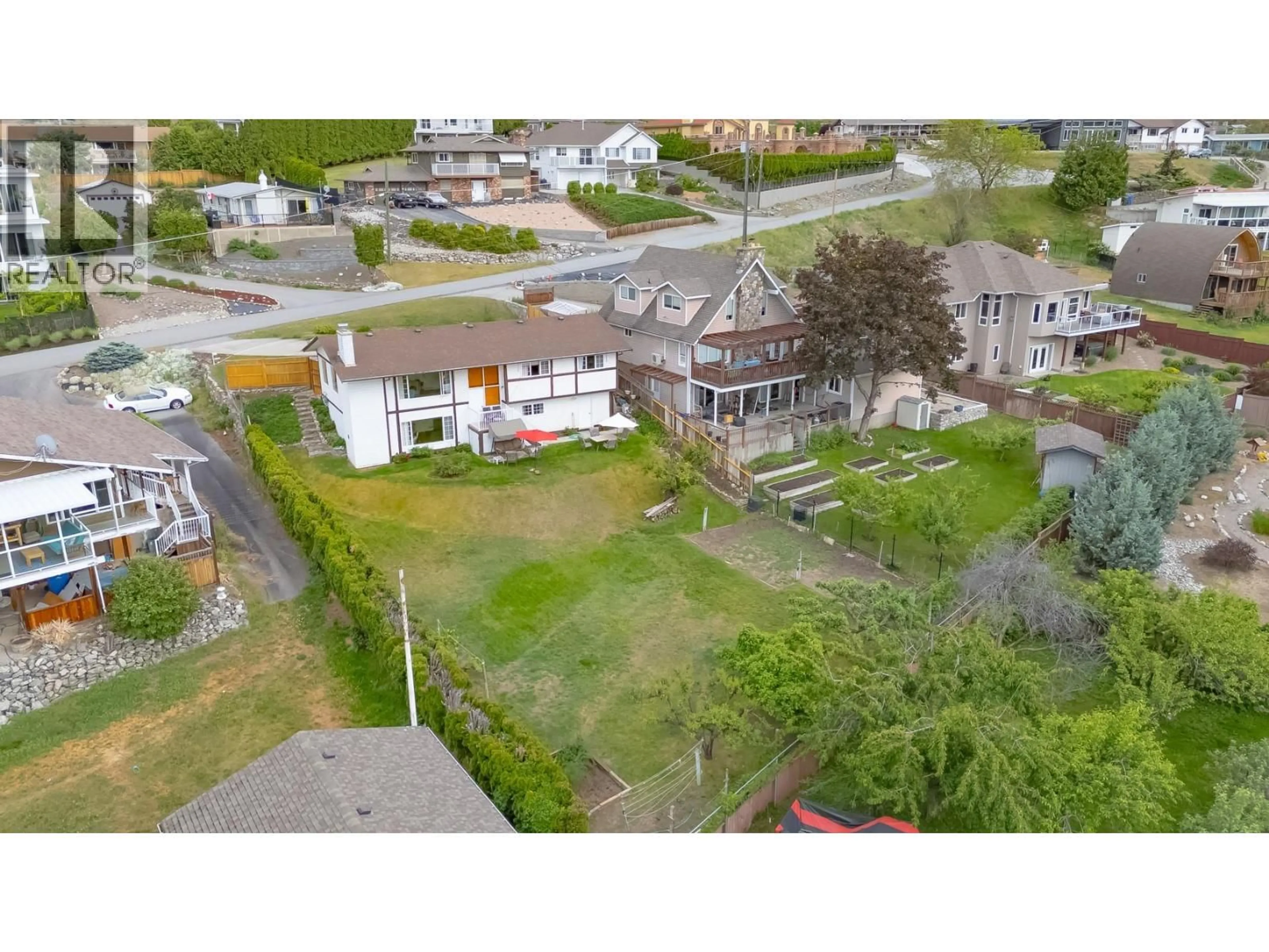A pic from outside/outdoor area/front of a property/back of a property/a pic from drone, unknown for 326 CARMEL CRESCENT, Okanagan Falls British Columbia V0H1R5