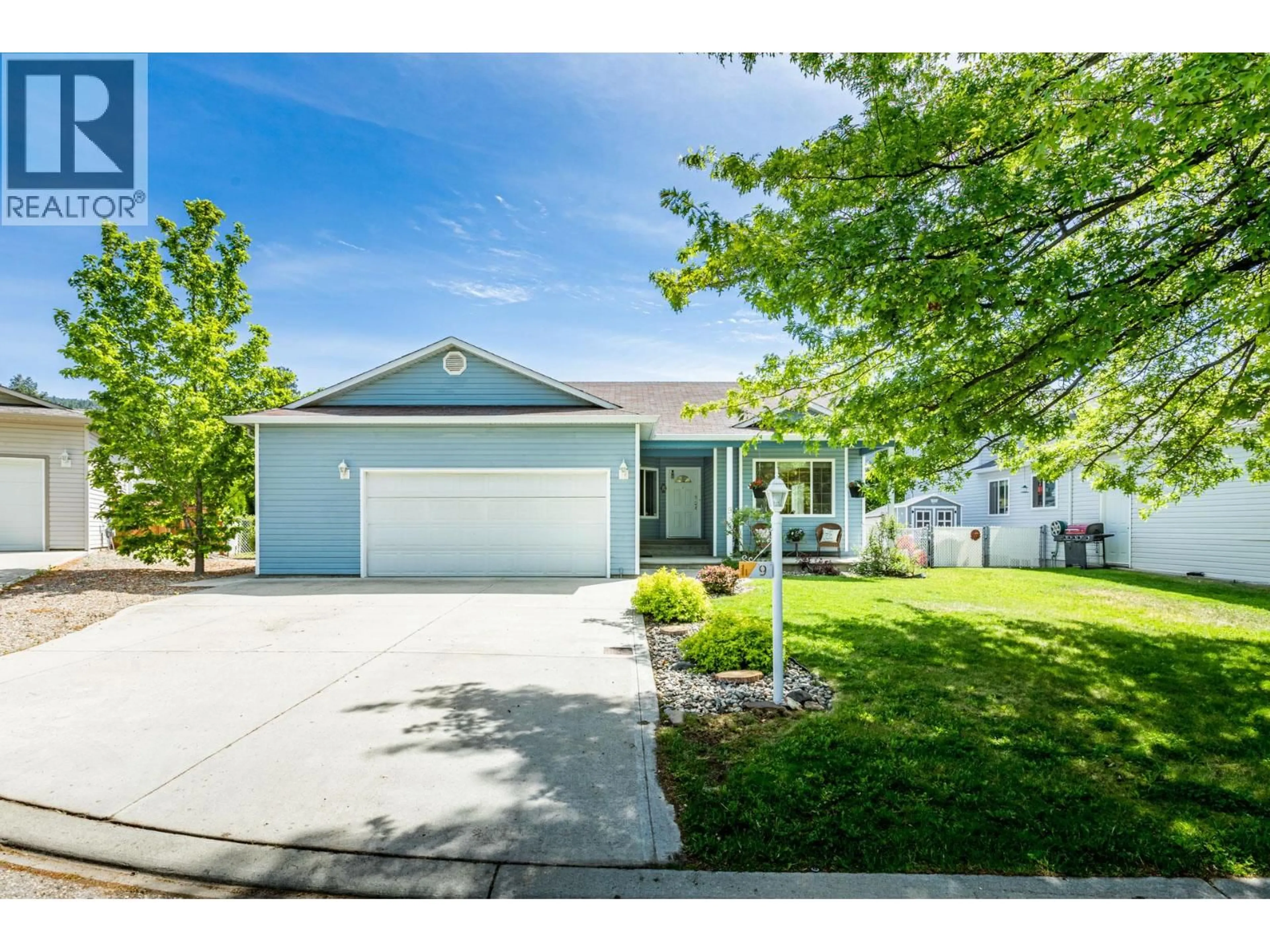 Home with vinyl exterior material, street for 9 - 4450 POSTILL DRIVE, Kelowna British Columbia V1X7T9