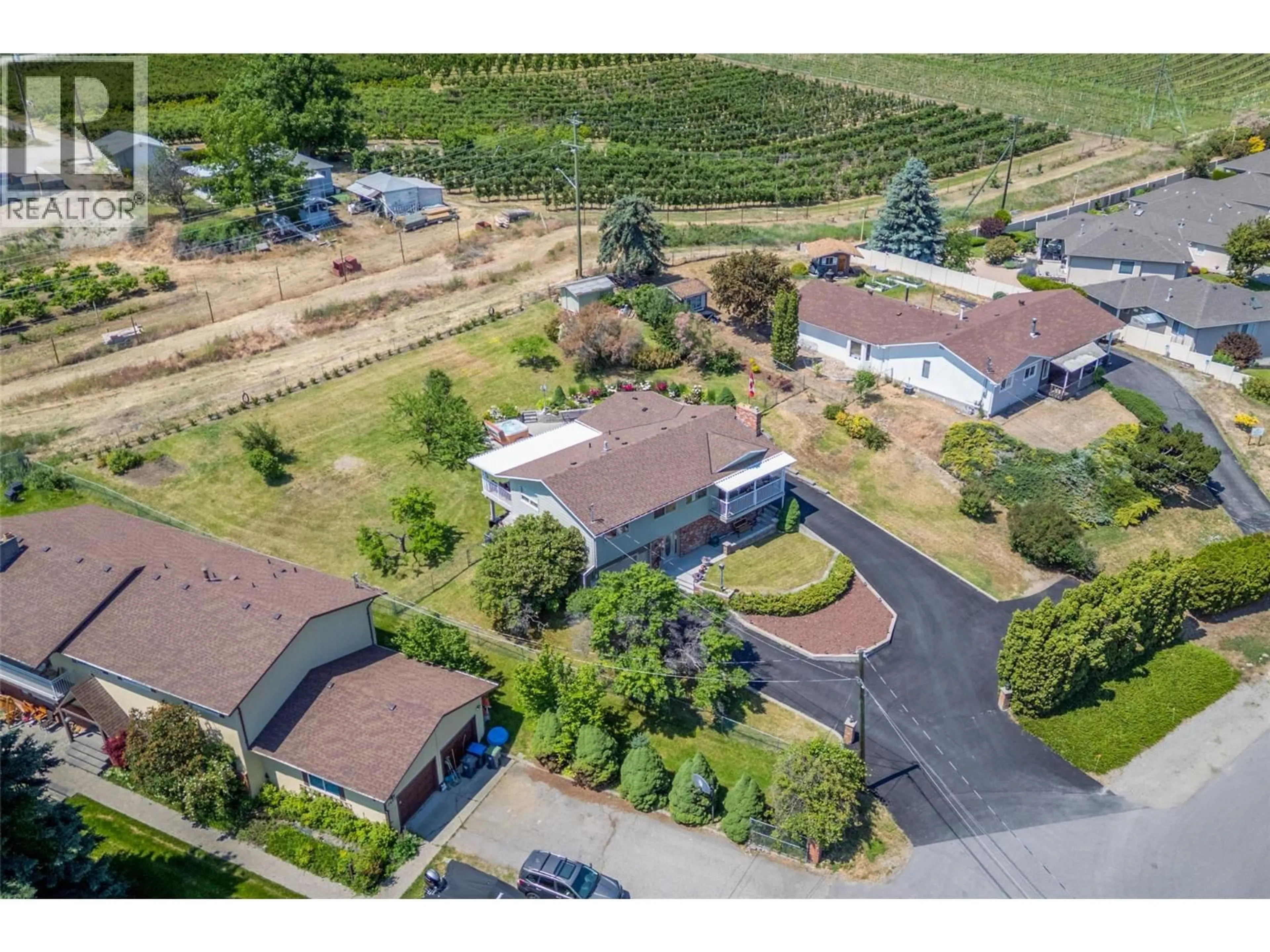 A pic from outside/outdoor area/front of a property/back of a property/a pic from drone, mountain view for 2489 CHIEFTAIN ROAD, West Kelowna British Columbia V4T1N3