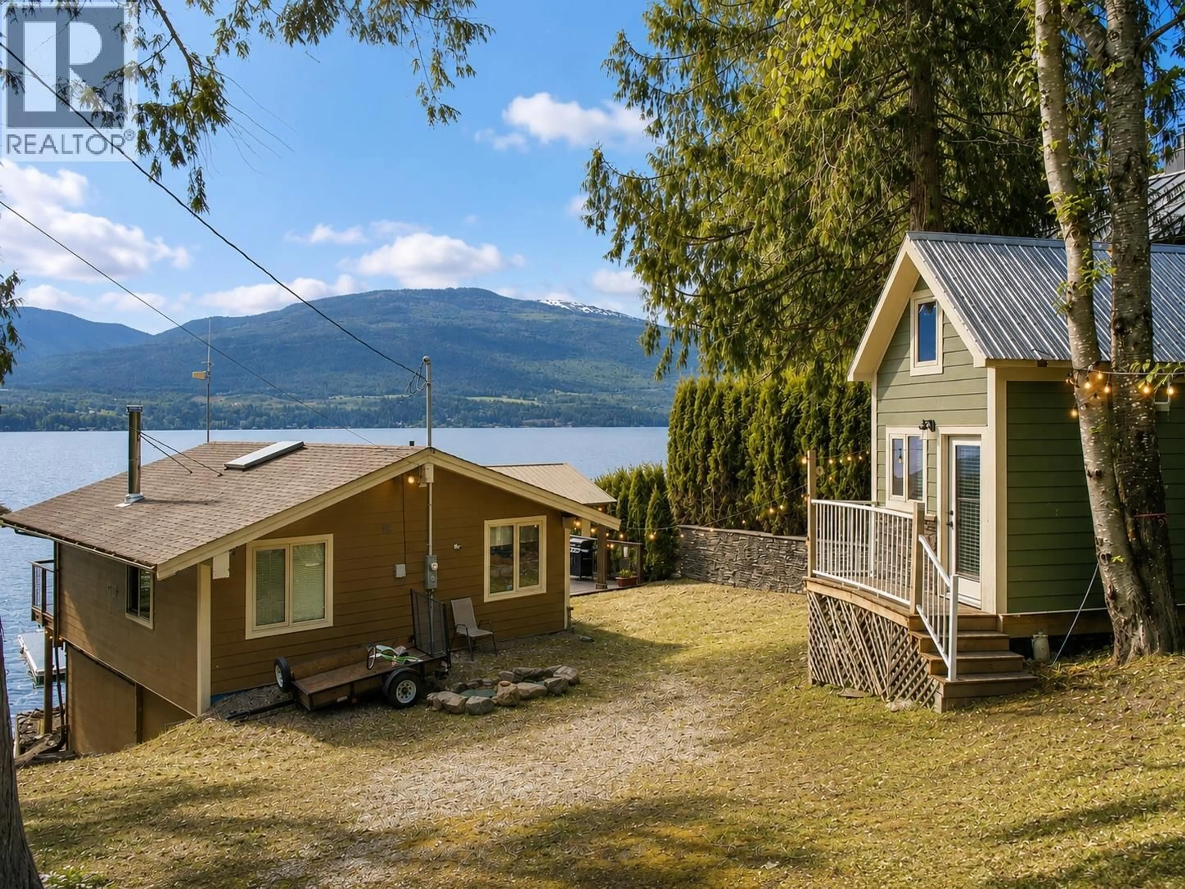 A pic from outside/outdoor area/front of a property/back of a property/a pic from drone, water/lake/river/ocean view for 3981 EAGLE BAY ROAD, Eagle Bay British Columbia V0E1T0