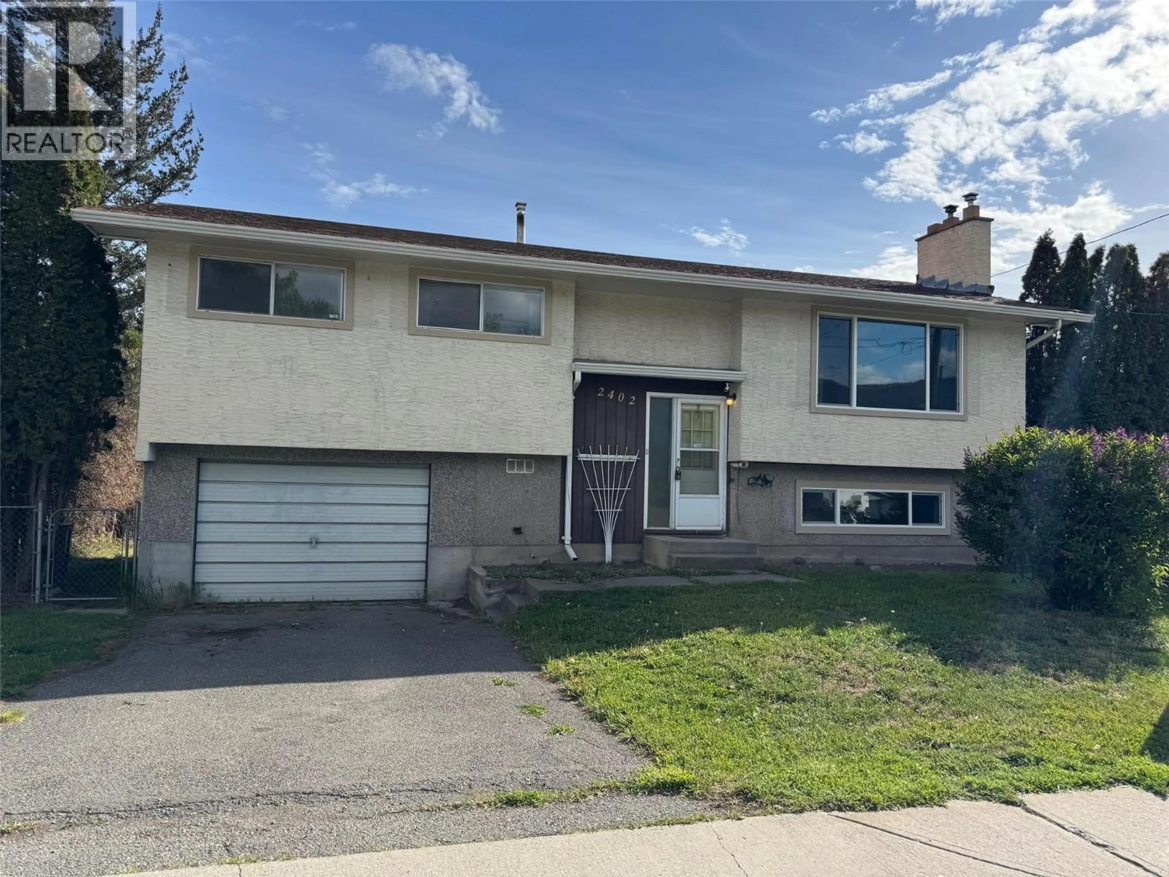 Home with vinyl exterior material, street for 2402 CLAPPERTON AVENUE, Merritt British Columbia V1K1A2