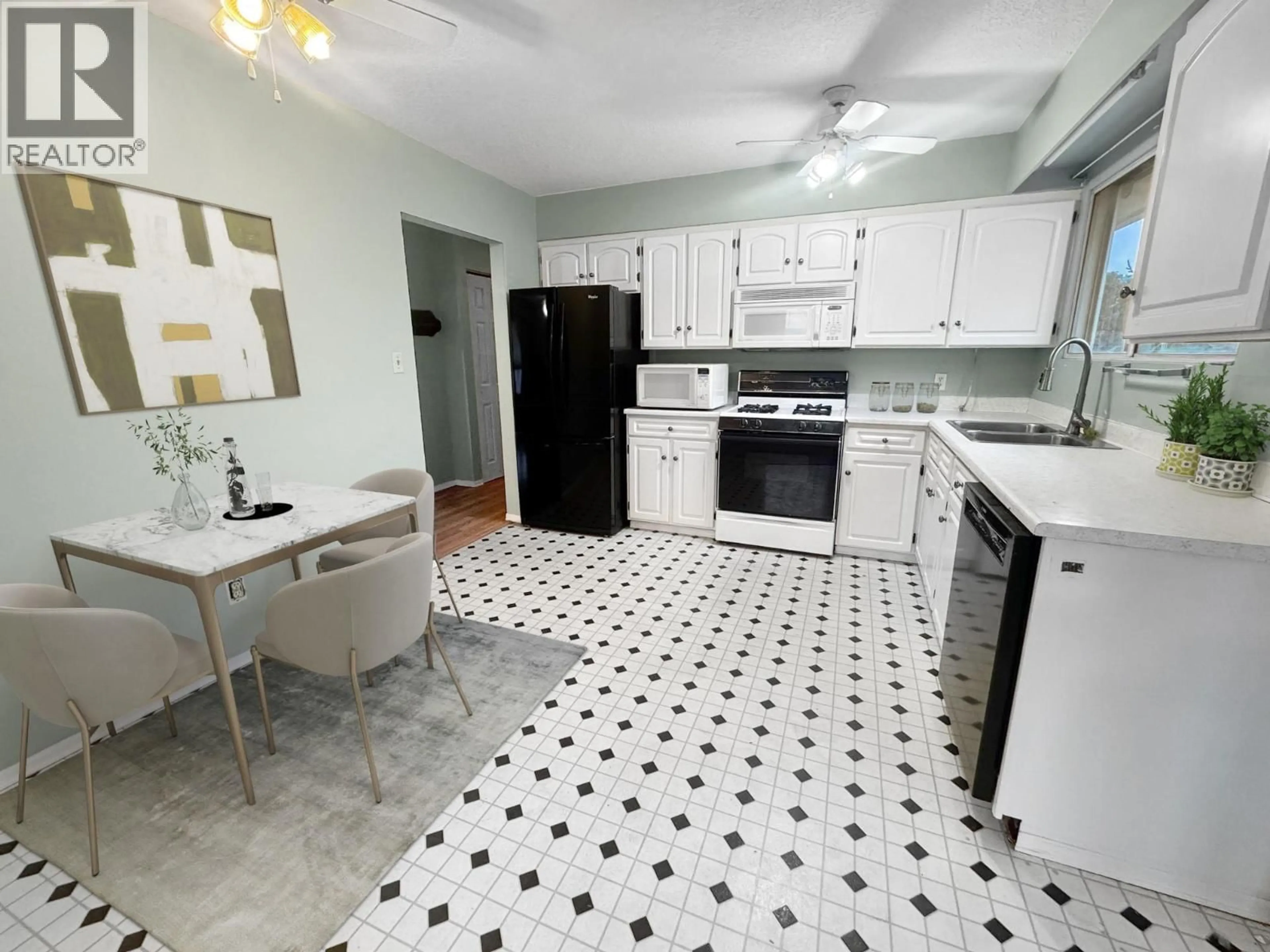 Standard kitchen, ceramic/tile floor for 2402 CLAPPERTON AVENUE, Merritt British Columbia V1K1A2