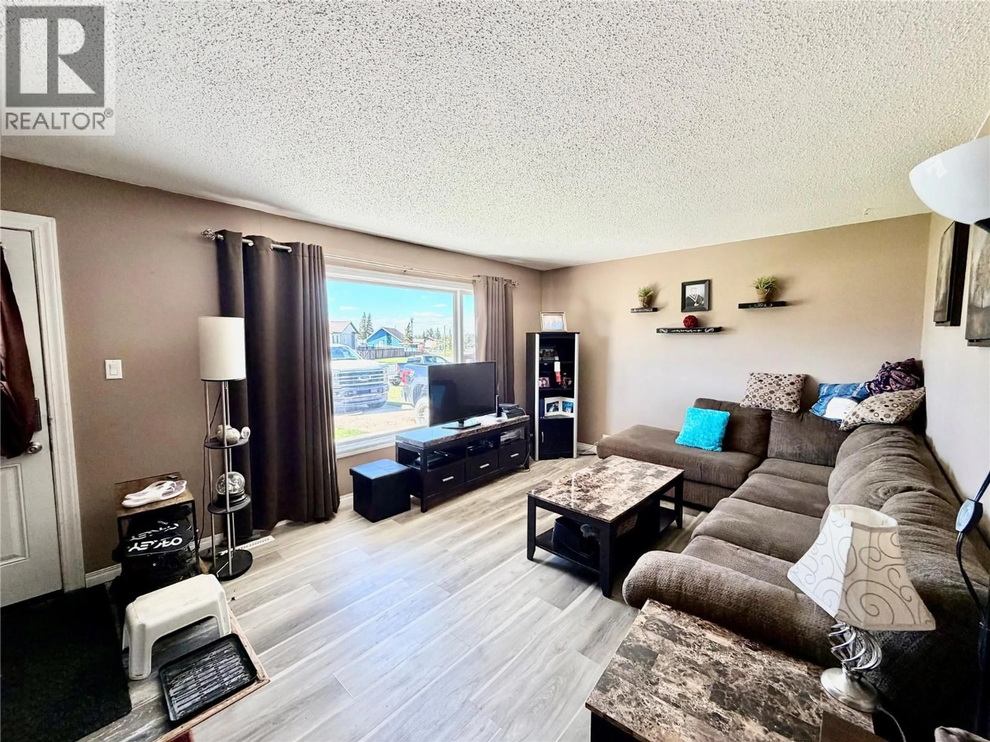 Living room with furniture, unknown for 10905 TURGEON DRIVE, Dawson Creek British Columbia V1G2W9