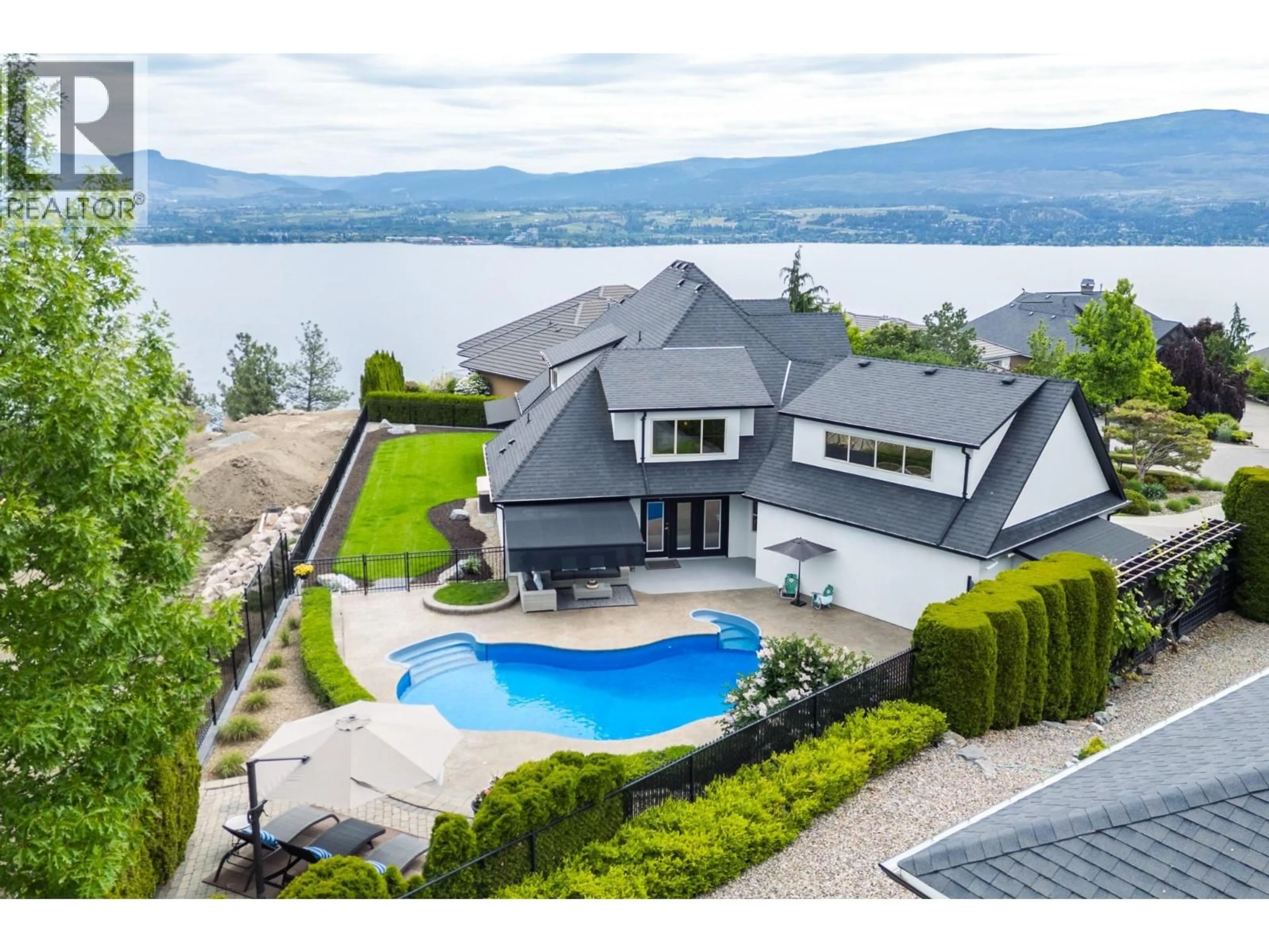 A pic from outside/outdoor area/front of a property/back of a property/a pic from drone, mountain view for 22 - 3103 THACKER DRIVE, West Kelowna British Columbia V1Z1X5