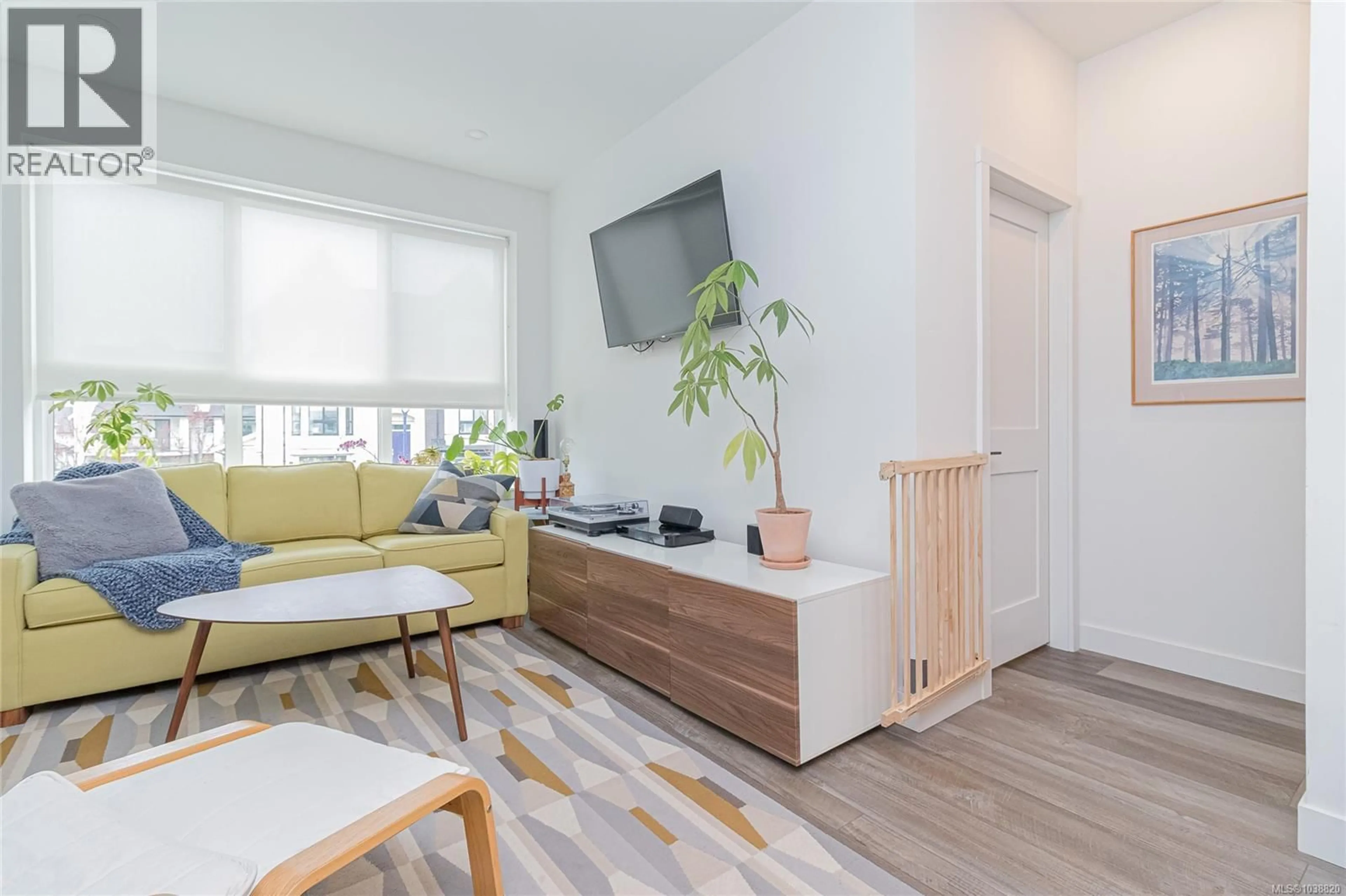 Living room with furniture, wood/laminate floor for 1047 BOXCAR CLOSE, Langford British Columbia V9B0Y4