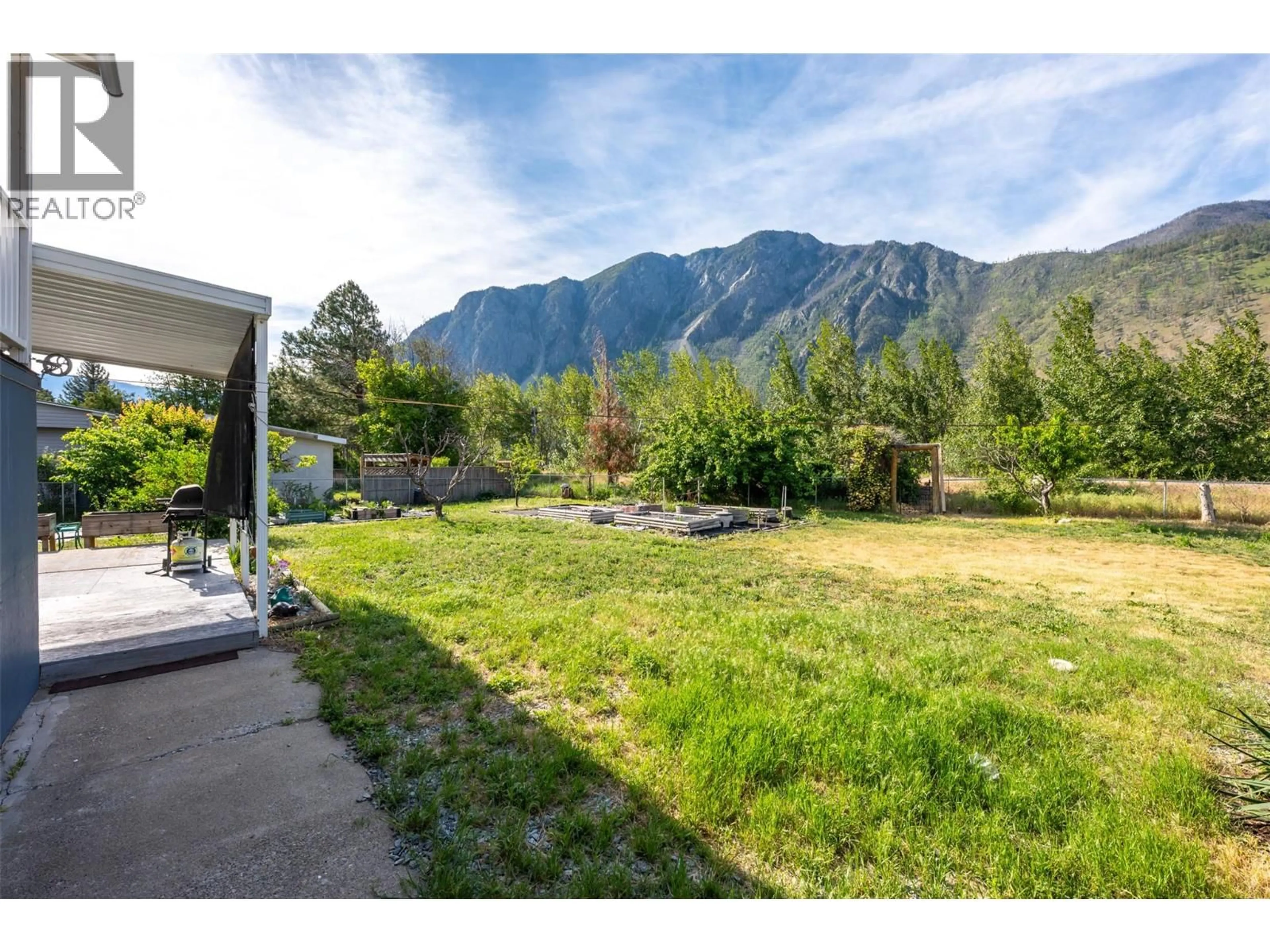 A pic from outside/outdoor area/front of a property/back of a property/a pic from drone, mountain view for SYKES CRESCENT, Keremeos British Columbia V0X1N3