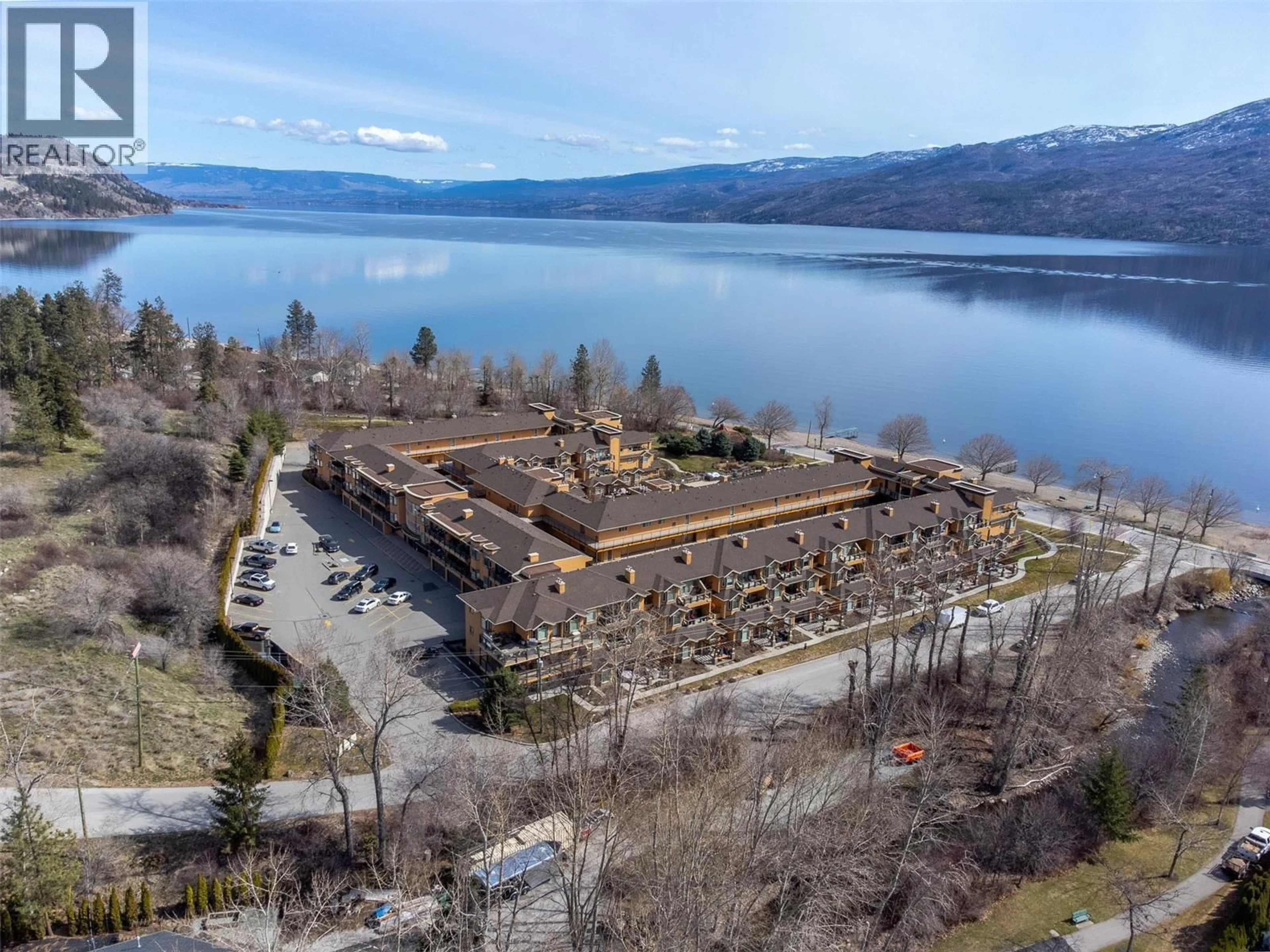 A pic from outside/outdoor area/front of a property/back of a property/a pic from drone, water/lake/river/ocean view for 201 - 3996 BEACH AVENUE, Peachland British Columbia V0H1X5