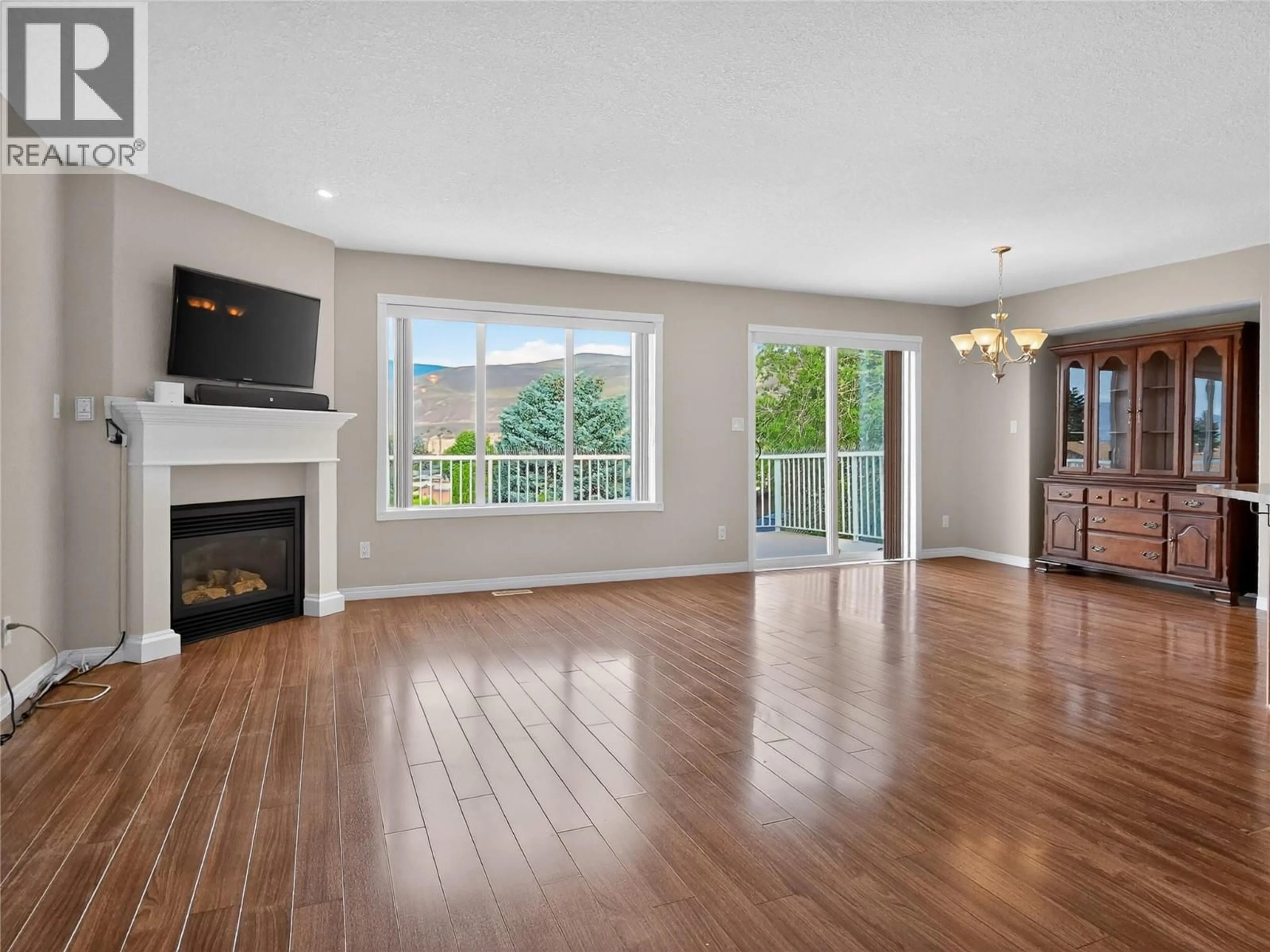 Living room with furniture, wood/laminate floor for 1204 VISTA HEIGHTS DRIVE, Ashcroft British Columbia V0K1A0