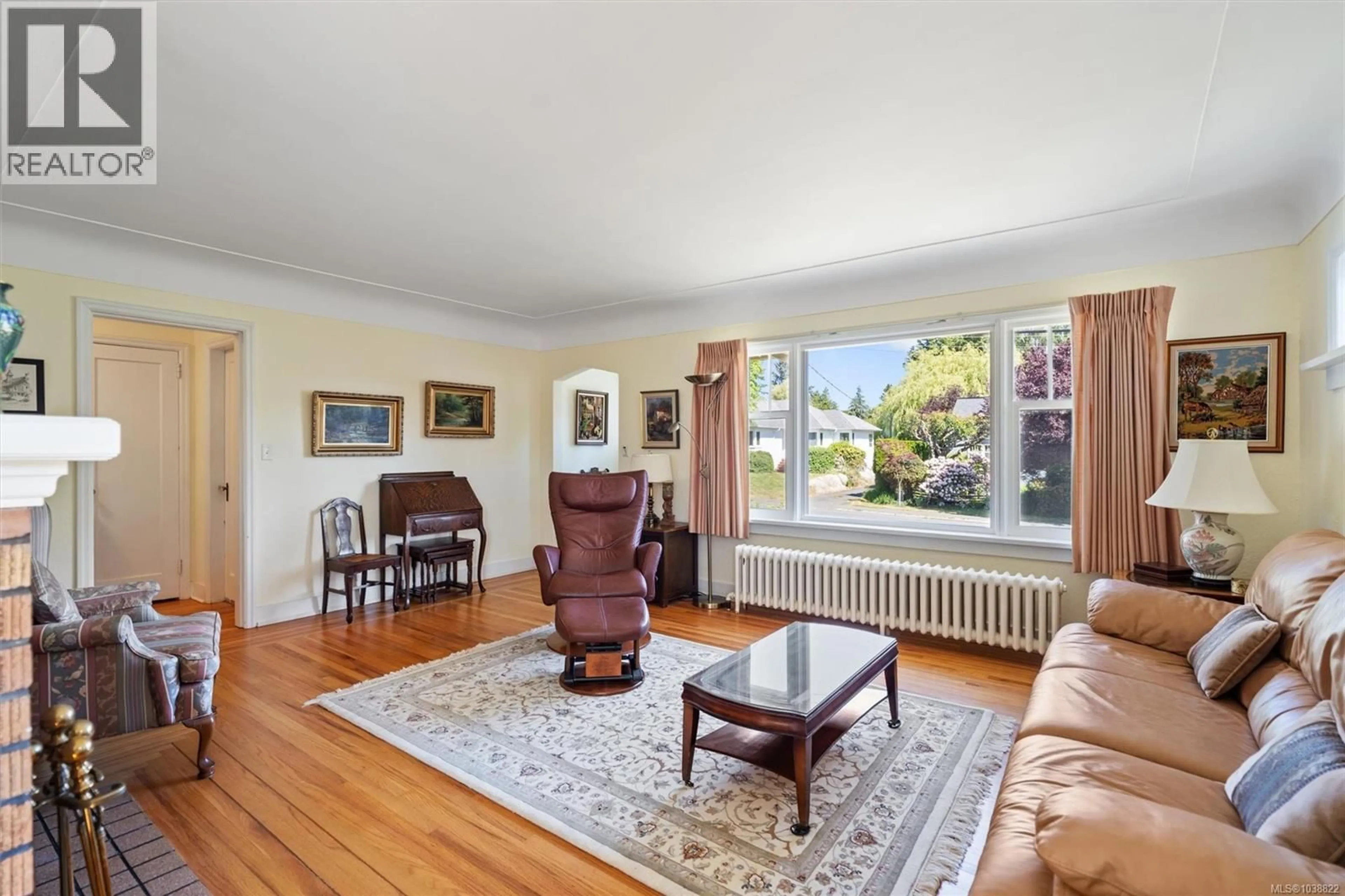 Living room with furniture, wood/laminate floor for 2183 CENTRAL AVENUE, Oak Bay British Columbia V8S2R6