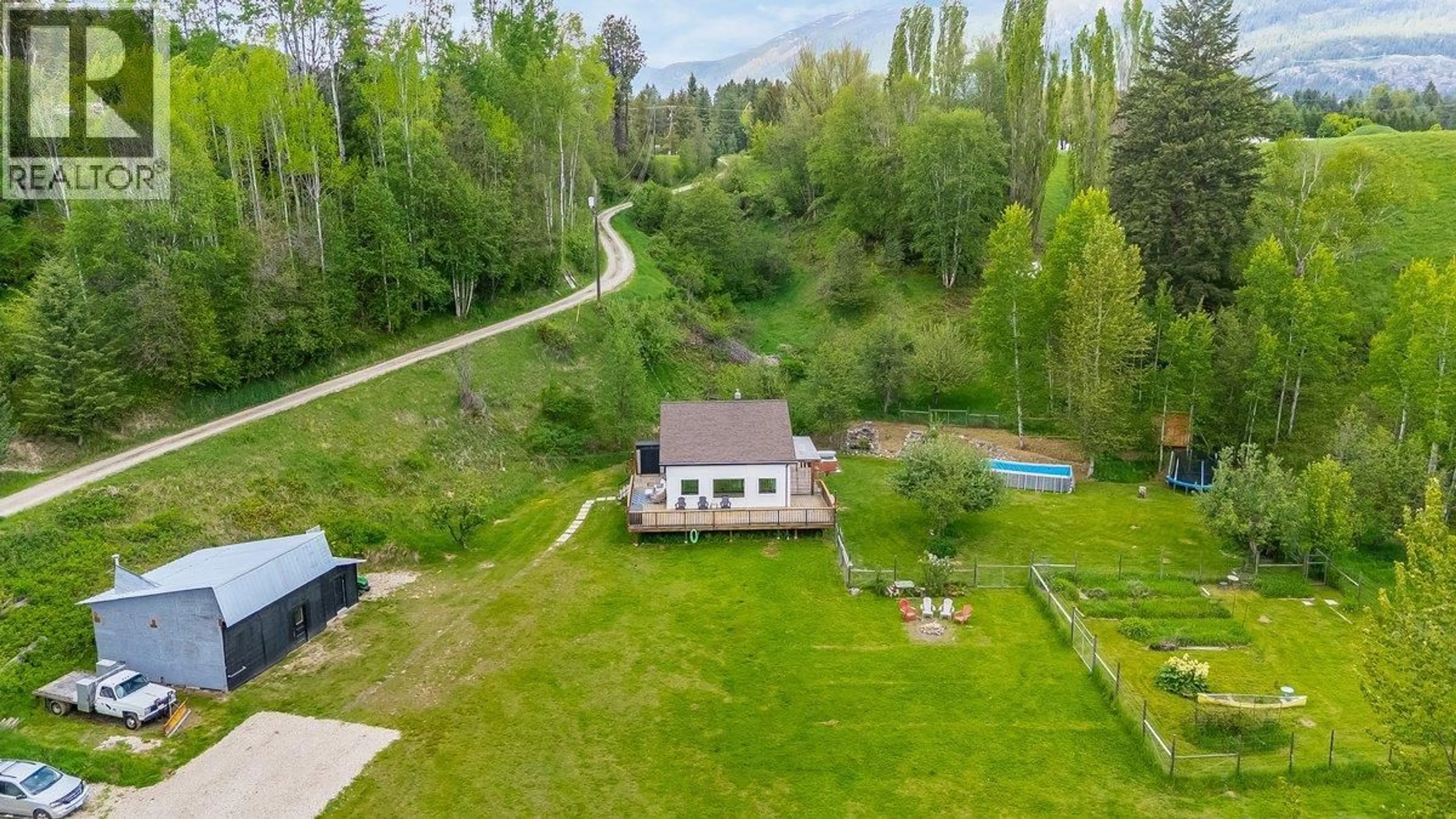 A pic from outside/outdoor area/front of a property/back of a property/a pic from drone, unknown for 3678 KRESTOVA CEMETERY ROAD, Krestova British Columbia V0G1H2