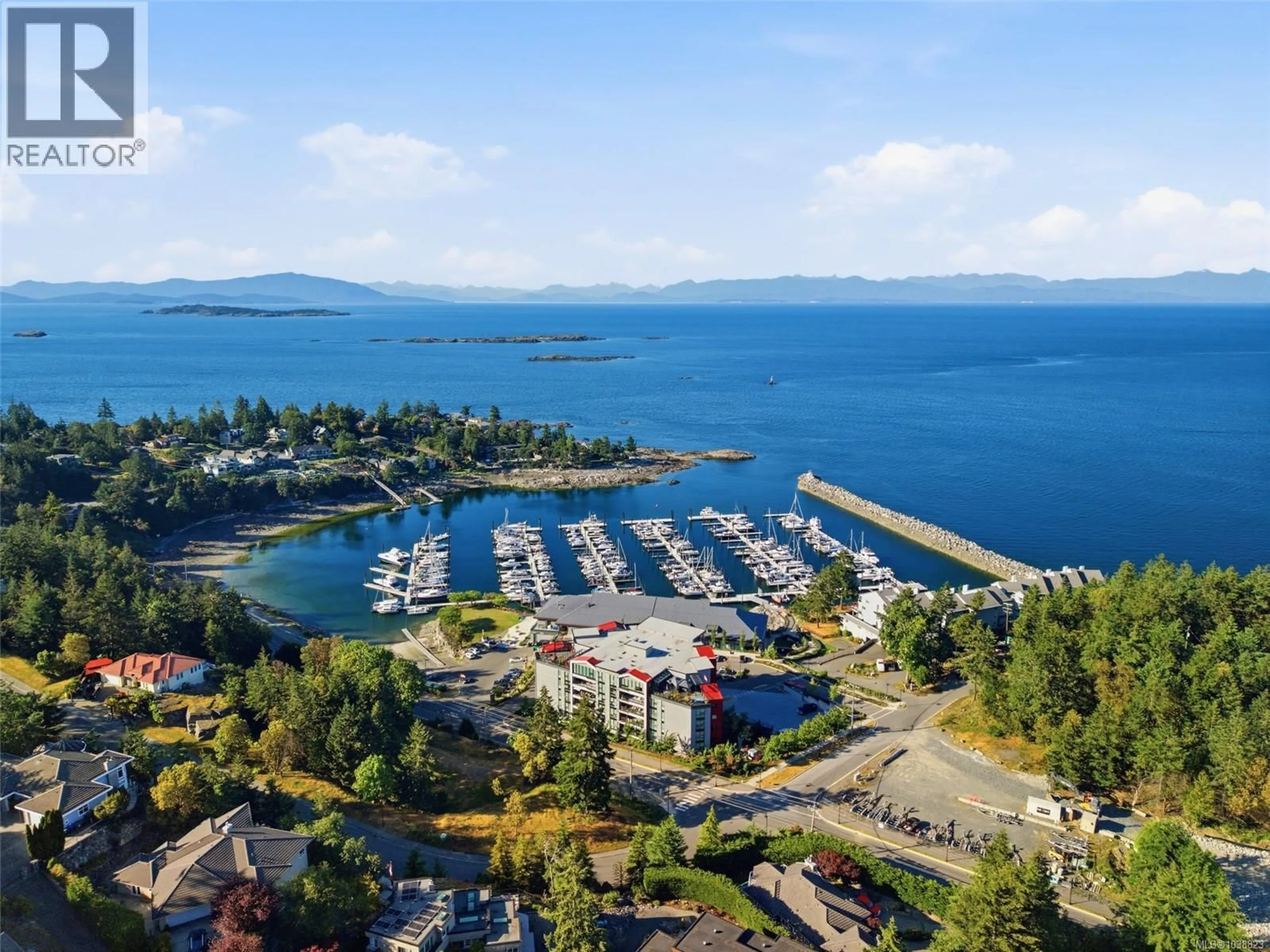 A pic from outside/outdoor area/front of a property/back of a property/a pic from drone, water/lake/river/ocean view for 502 - 3529 DOLPHIN DRIVE, Nanoose Bay British Columbia V9P9J7