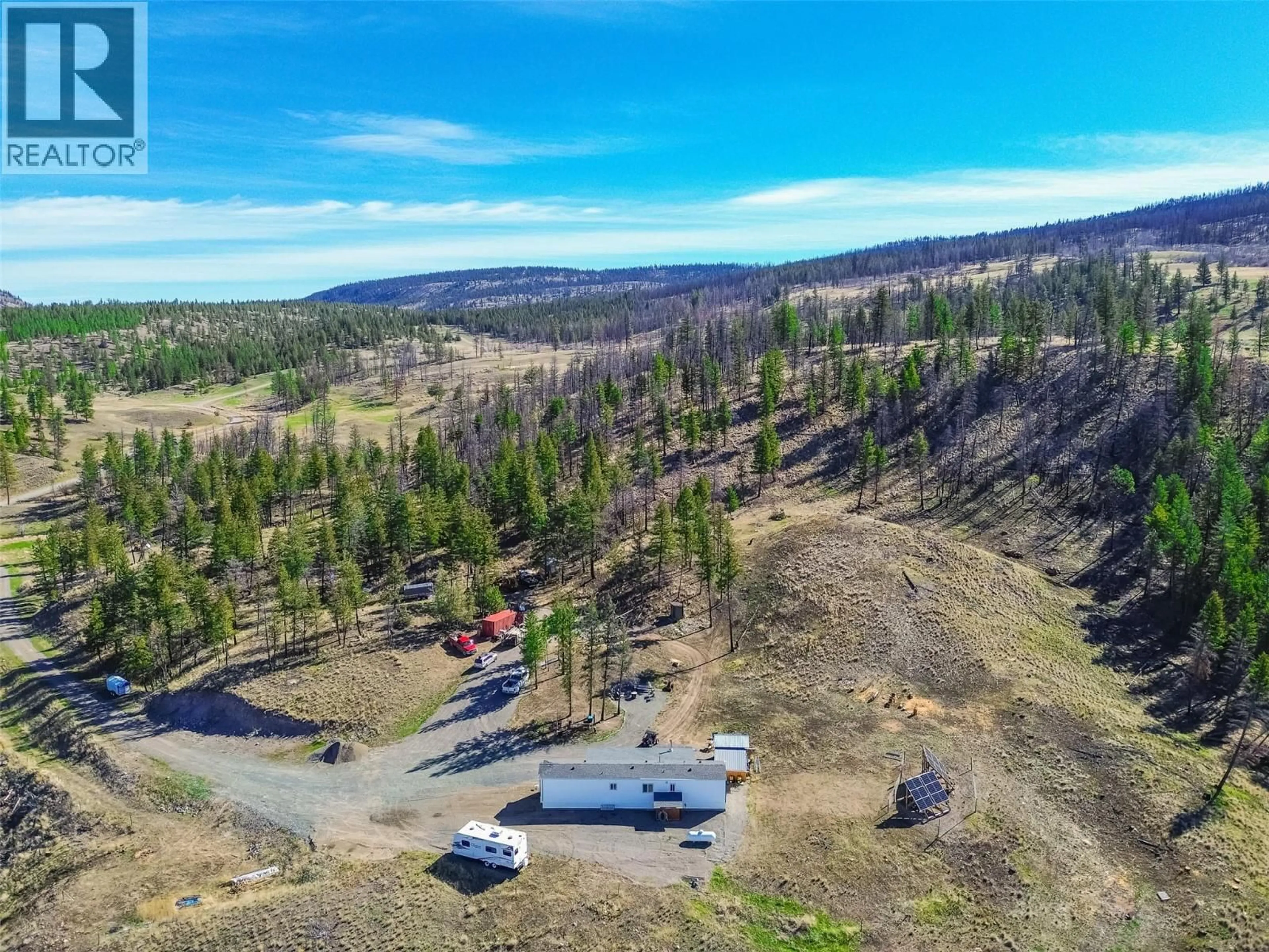 A pic from outside/outdoor area/front of a property/back of a property/a pic from drone, forest/trees view for 1832 MOUND-LOON LAKE ROAD, Clinton British Columbia V0K1K0