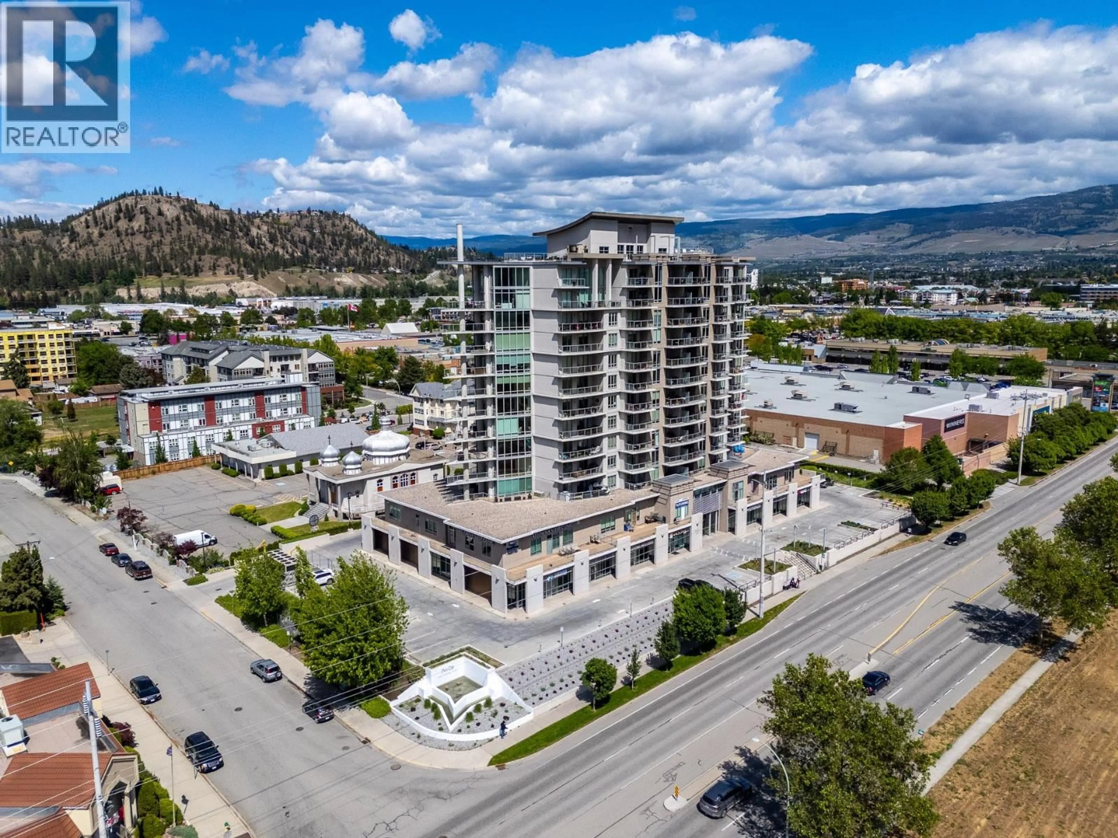 A pic from outside/outdoor area/front of a property/back of a property/a pic from drone, unknown for 1008 - 2040 SPRINGFIELD ROAD, Kelowna British Columbia V1Y9N7