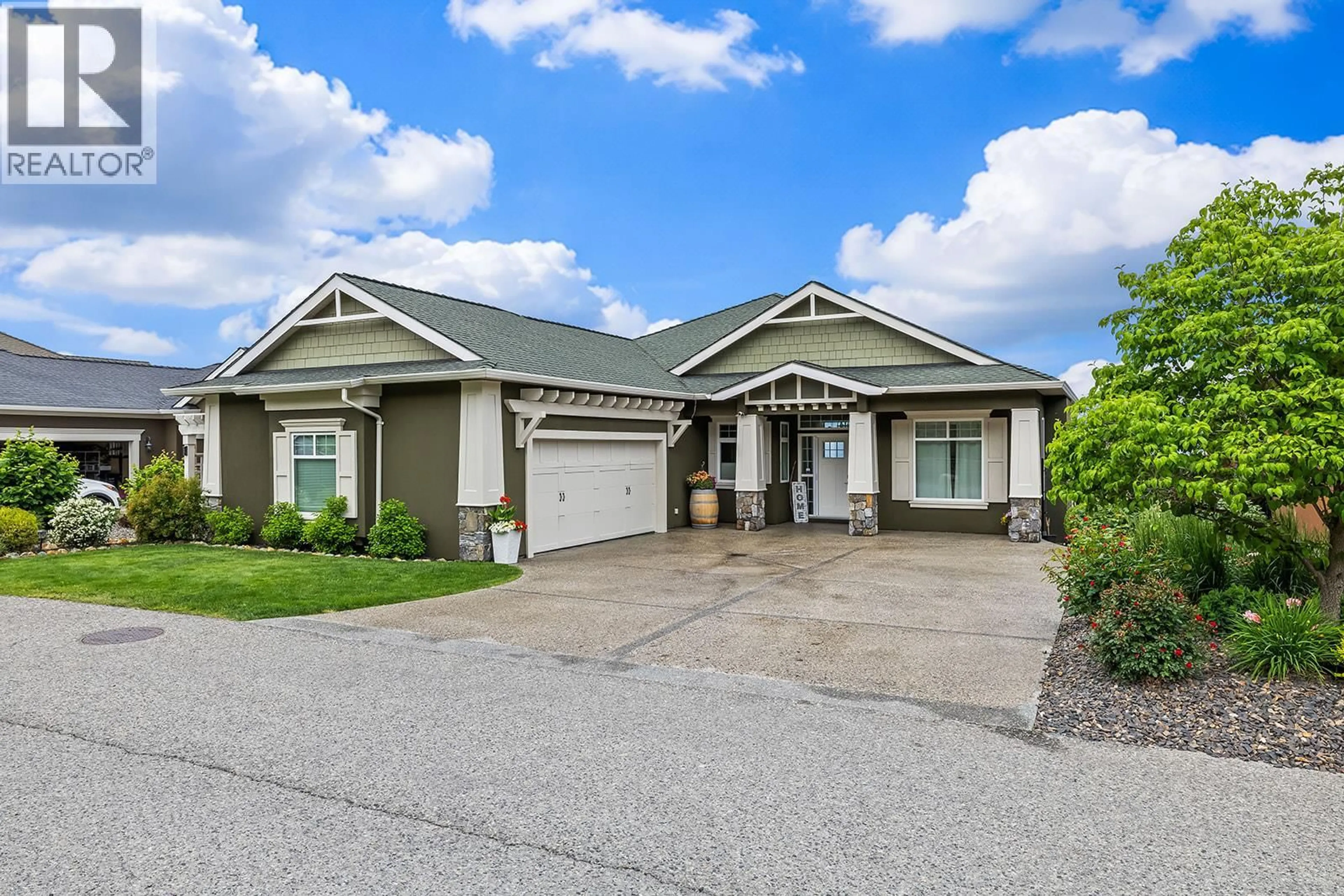 Home with vinyl exterior material, street for 629 ALMANDINE COURT, Kelowna British Columbia V1W4Z5