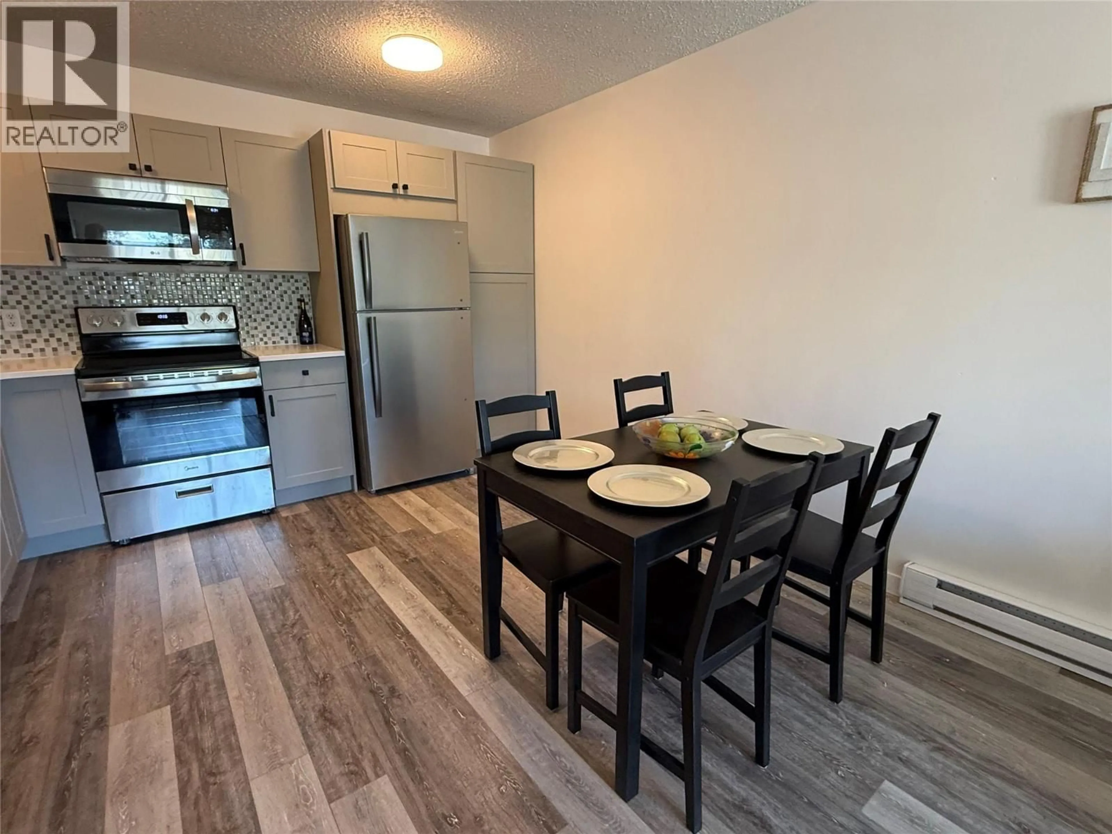 Standard kitchen, wood/laminate floor for 415 - 130 SKAHA PLACE, Penticton British Columbia V2A7J6