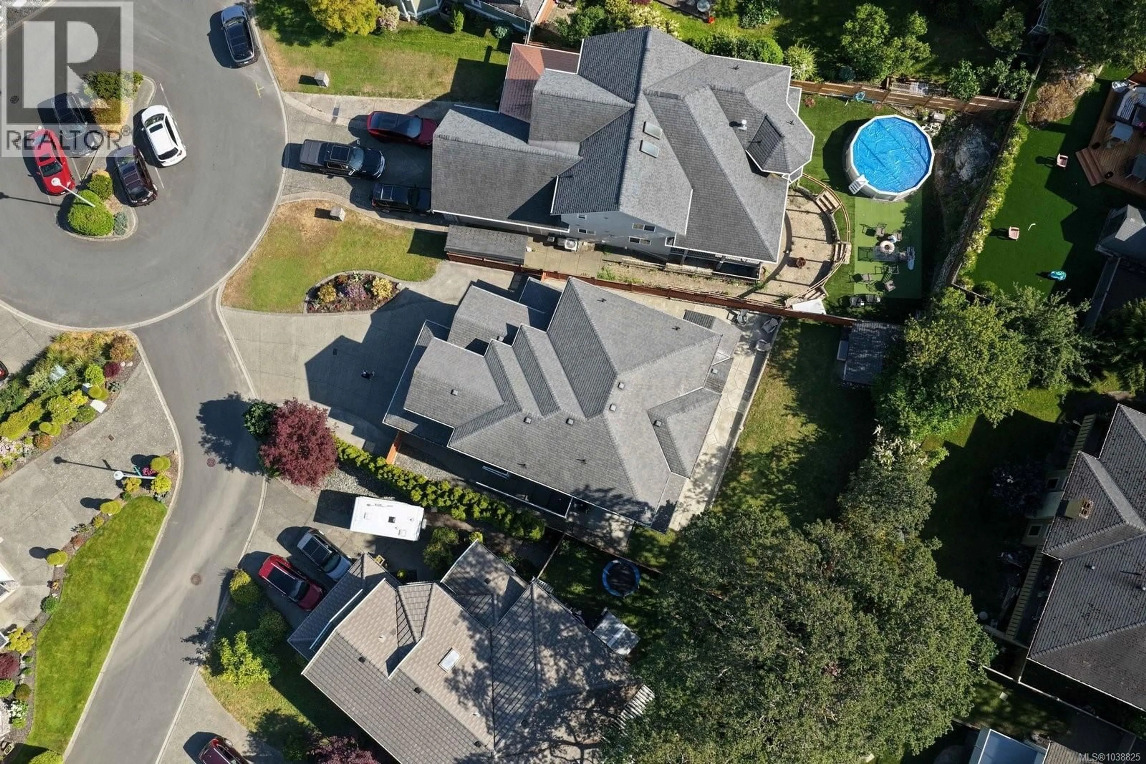 A pic from outside/outdoor area/front of a property/back of a property/a pic from drone, street for 4240 OAKVIEW PLACE, Saanich British Columbia V8N6M7