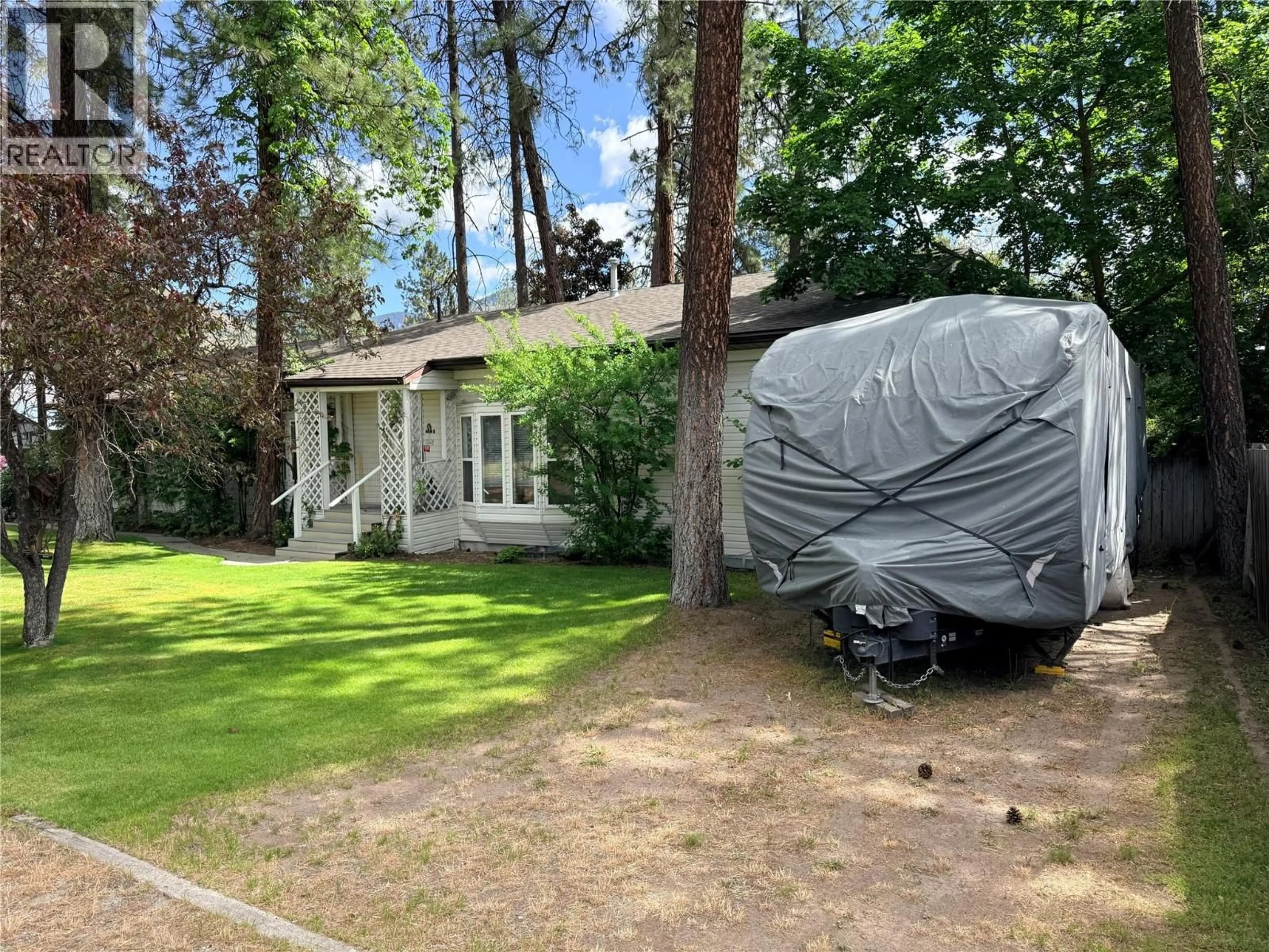 Home with vinyl exterior material, street for 6240 VINE ROAD, Grand Forks British Columbia V0H1H4