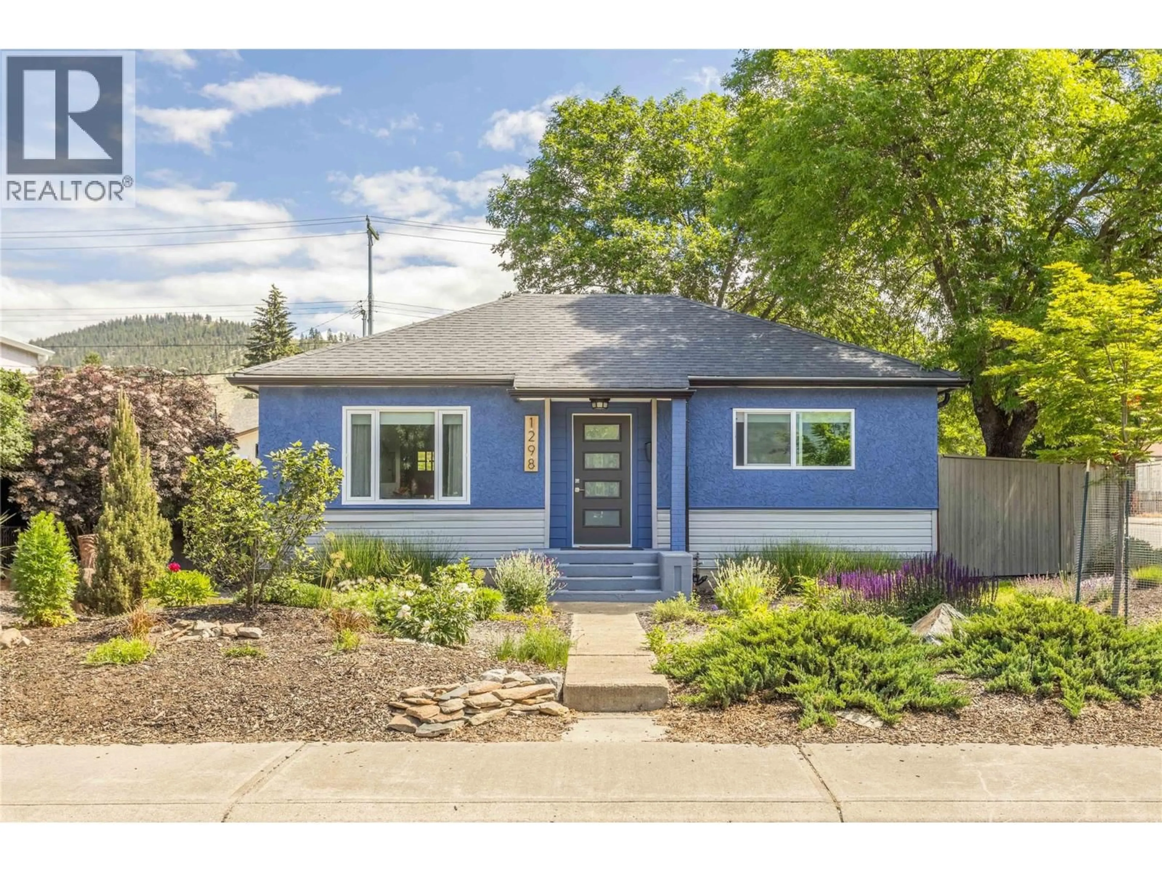 Home with vinyl exterior material, street for 1298 KILWINNING STREET, Penticton British Columbia V2A4P3