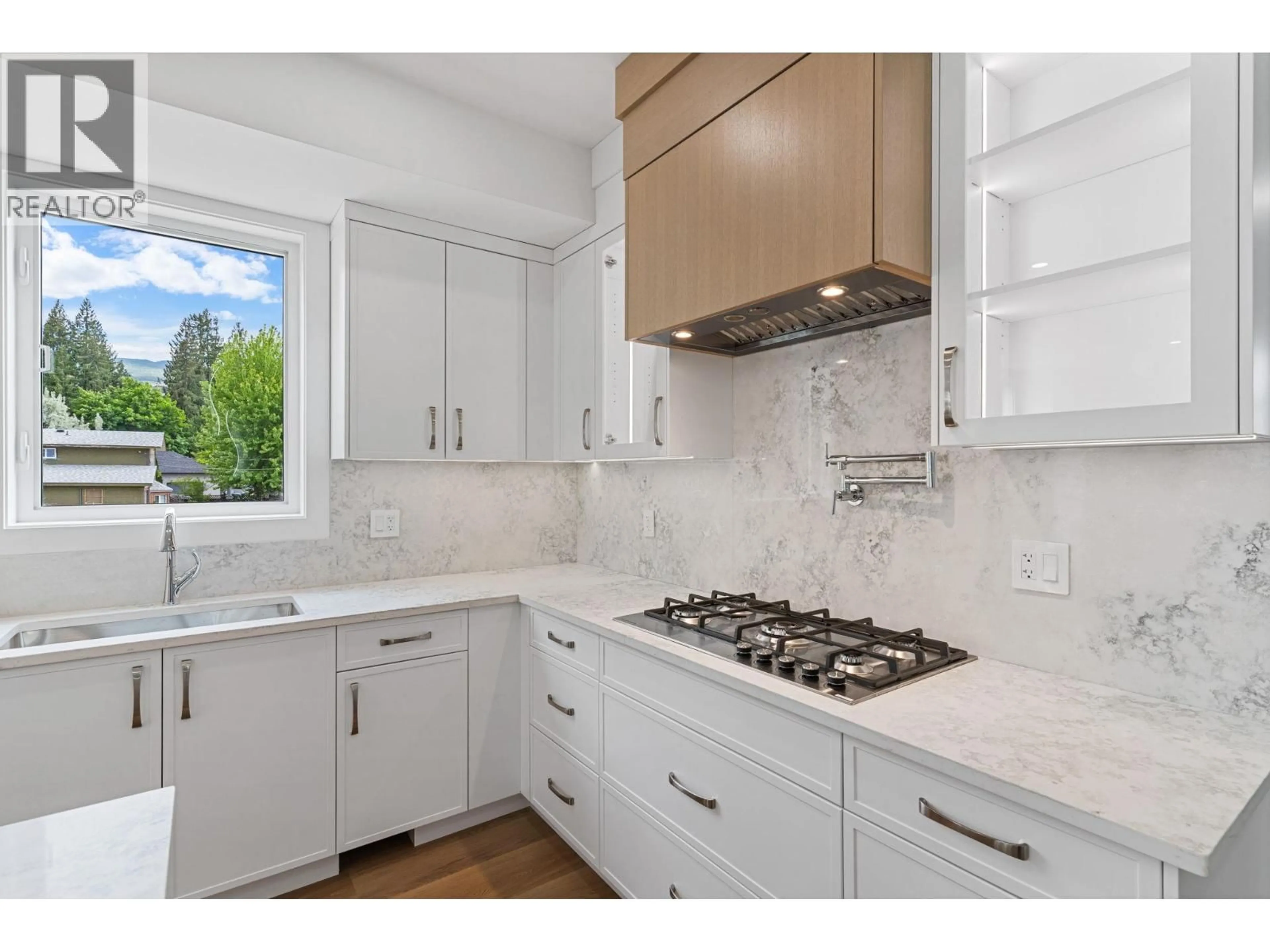 Open concept kitchen, ceramic/tile floor for 4567 GORDON DRIVE, Kelowna British Columbia V1W1T3