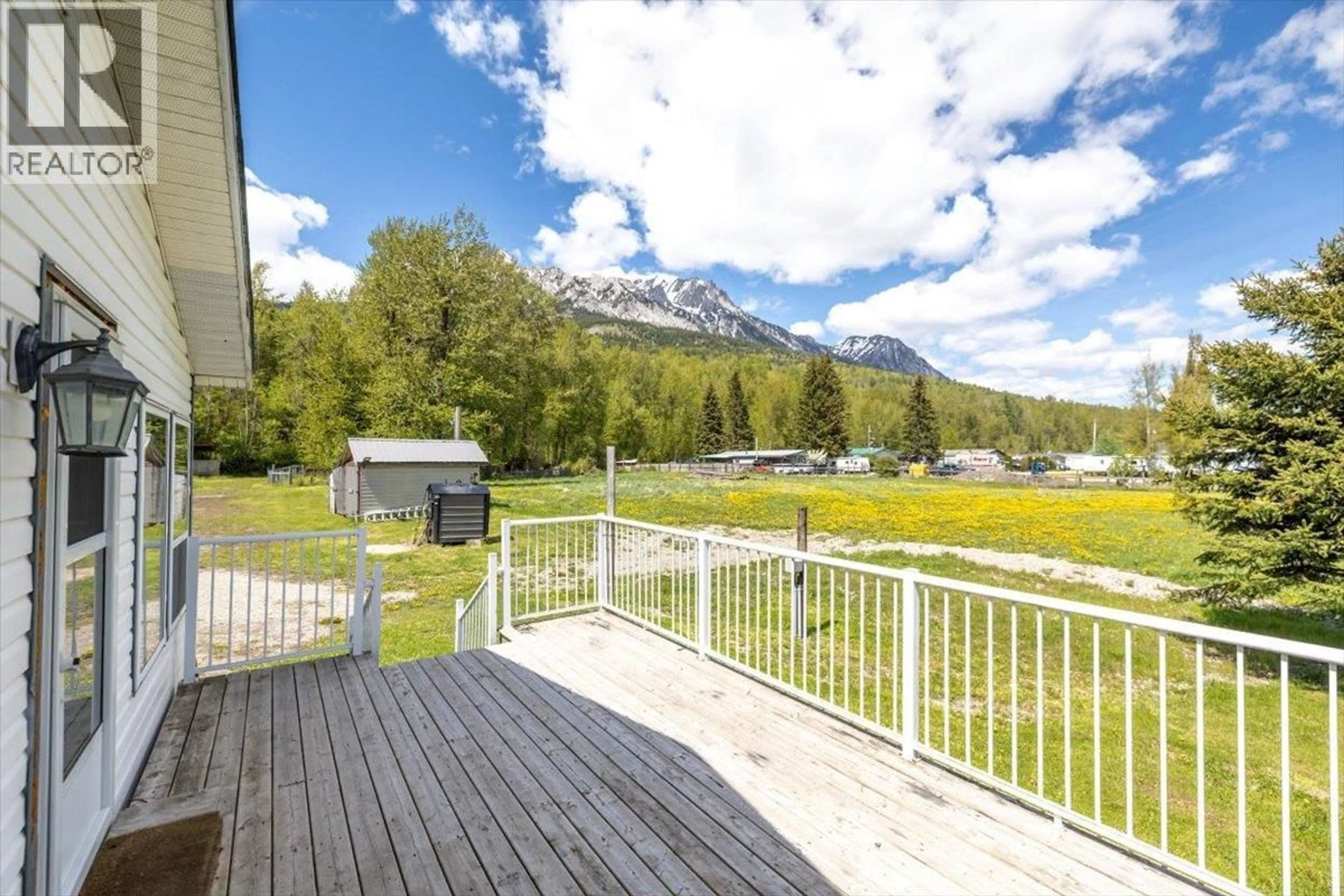 A pic from outside/outdoor area/front of a property/back of a property/a pic from drone, mountain view for 1989 3 HIGHWAY, Fernie British Columbia V0B1M5
