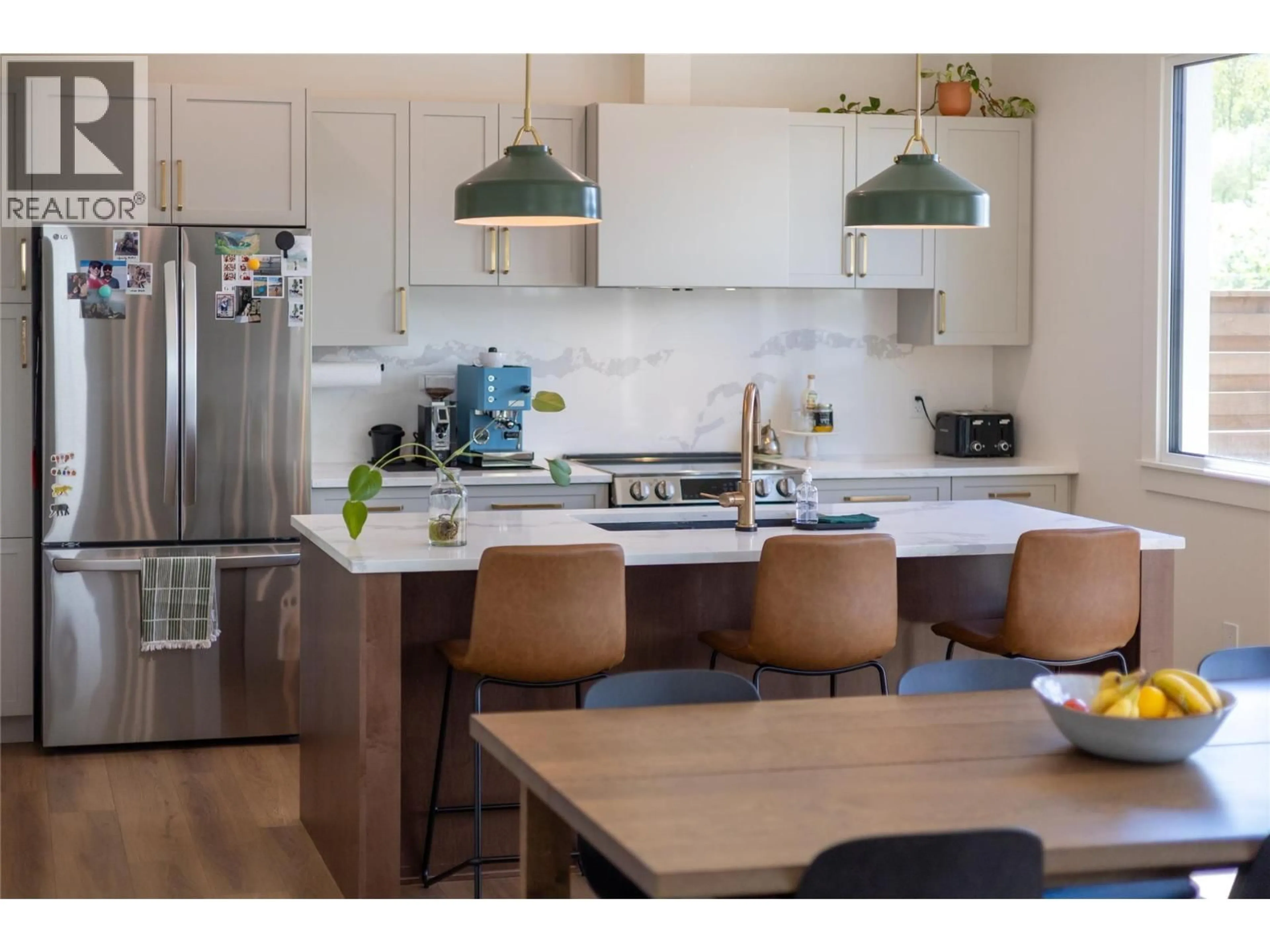 Open concept kitchen, wood/laminate floor for 1000 HAND AVENUE, Fernie British Columbia V0B1M0