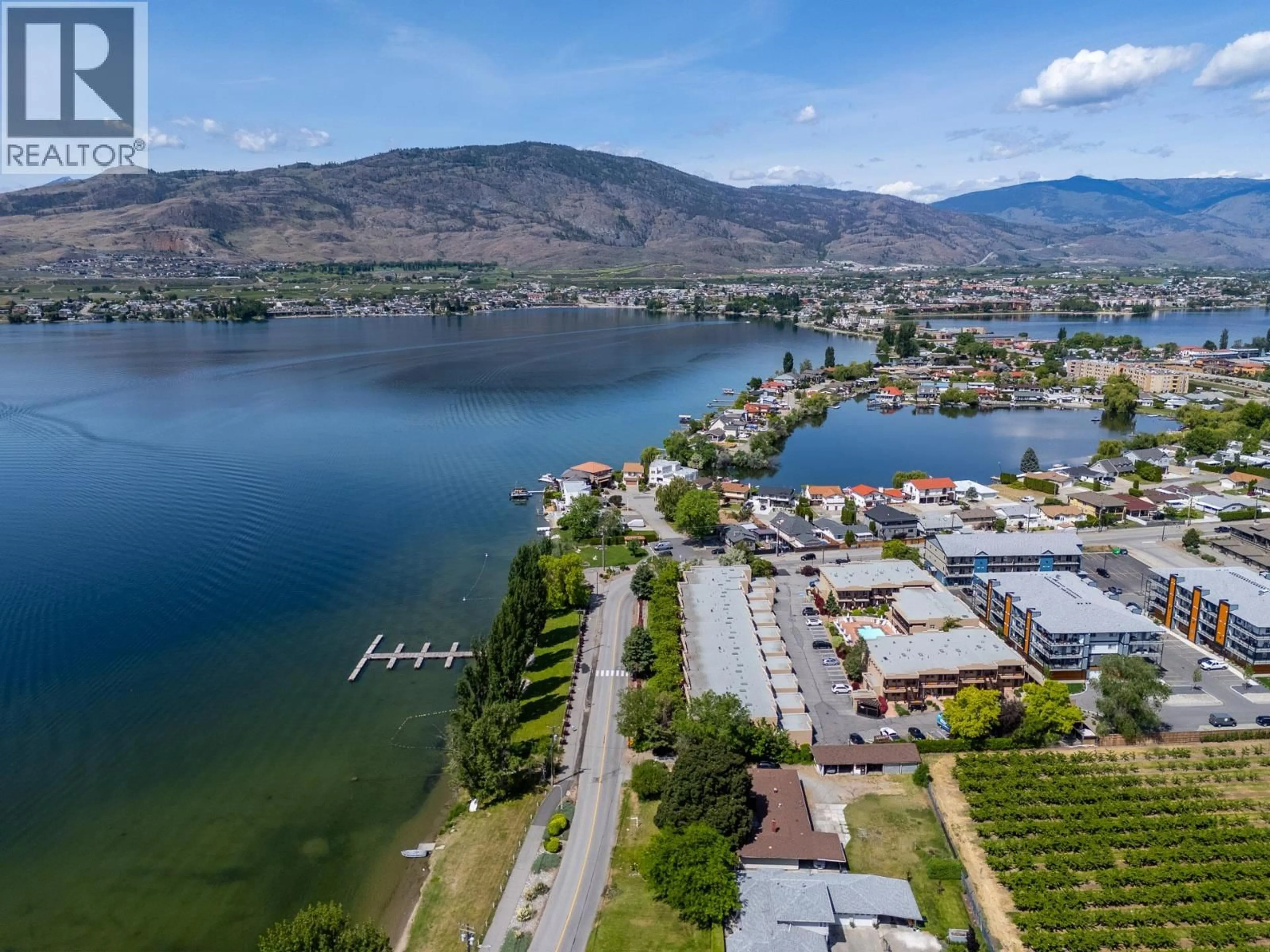 A pic from outside/outdoor area/front of a property/back of a property/a pic from drone, water/lake/river/ocean view for 5231 LAKESHORE DRIVE, Osoyoos British Columbia V0H1V6