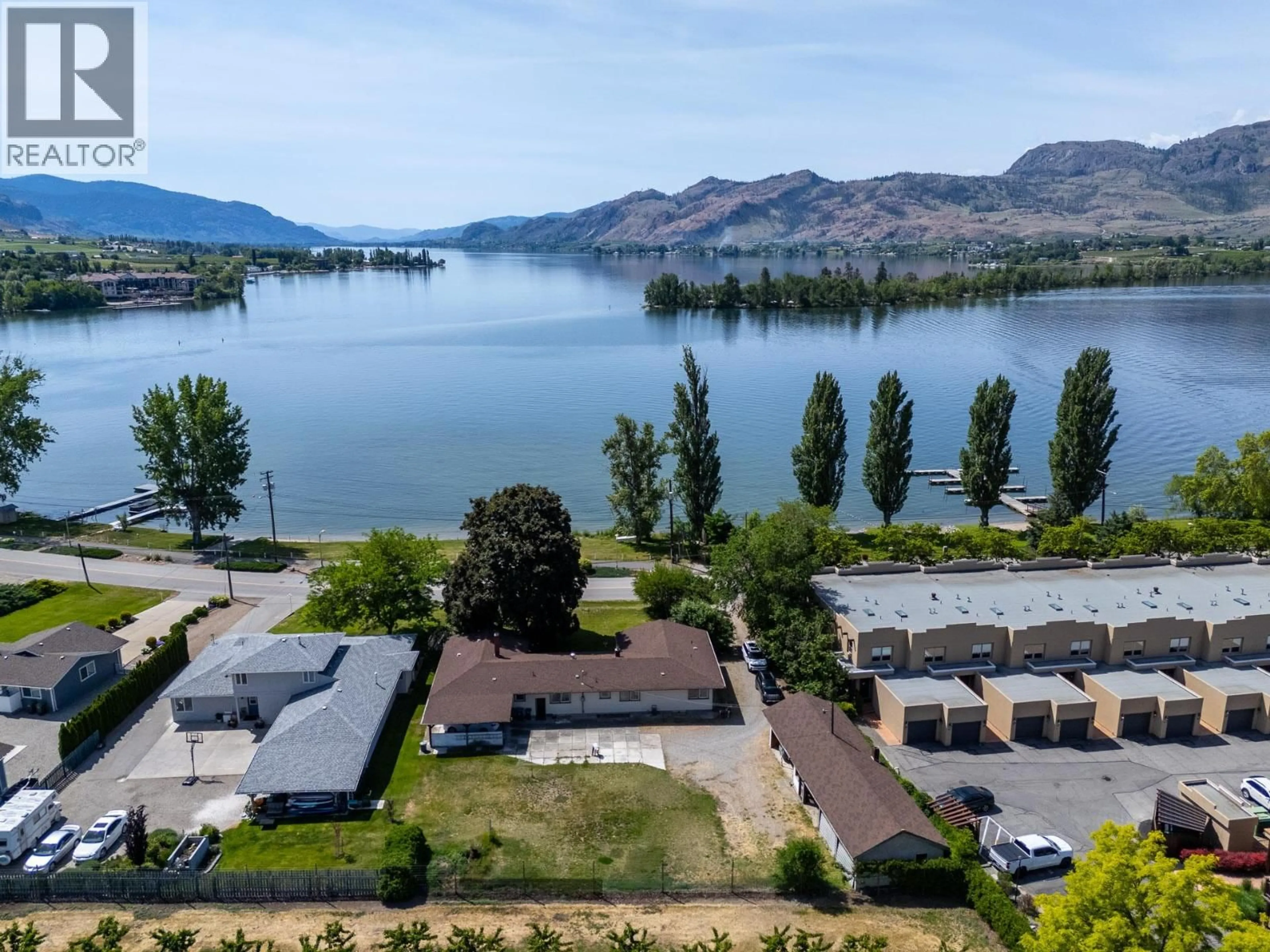 A pic from outside/outdoor area/front of a property/back of a property/a pic from drone, water/lake/river/ocean view for 5231 LAKESHORE DRIVE, Osoyoos British Columbia V0H1V6