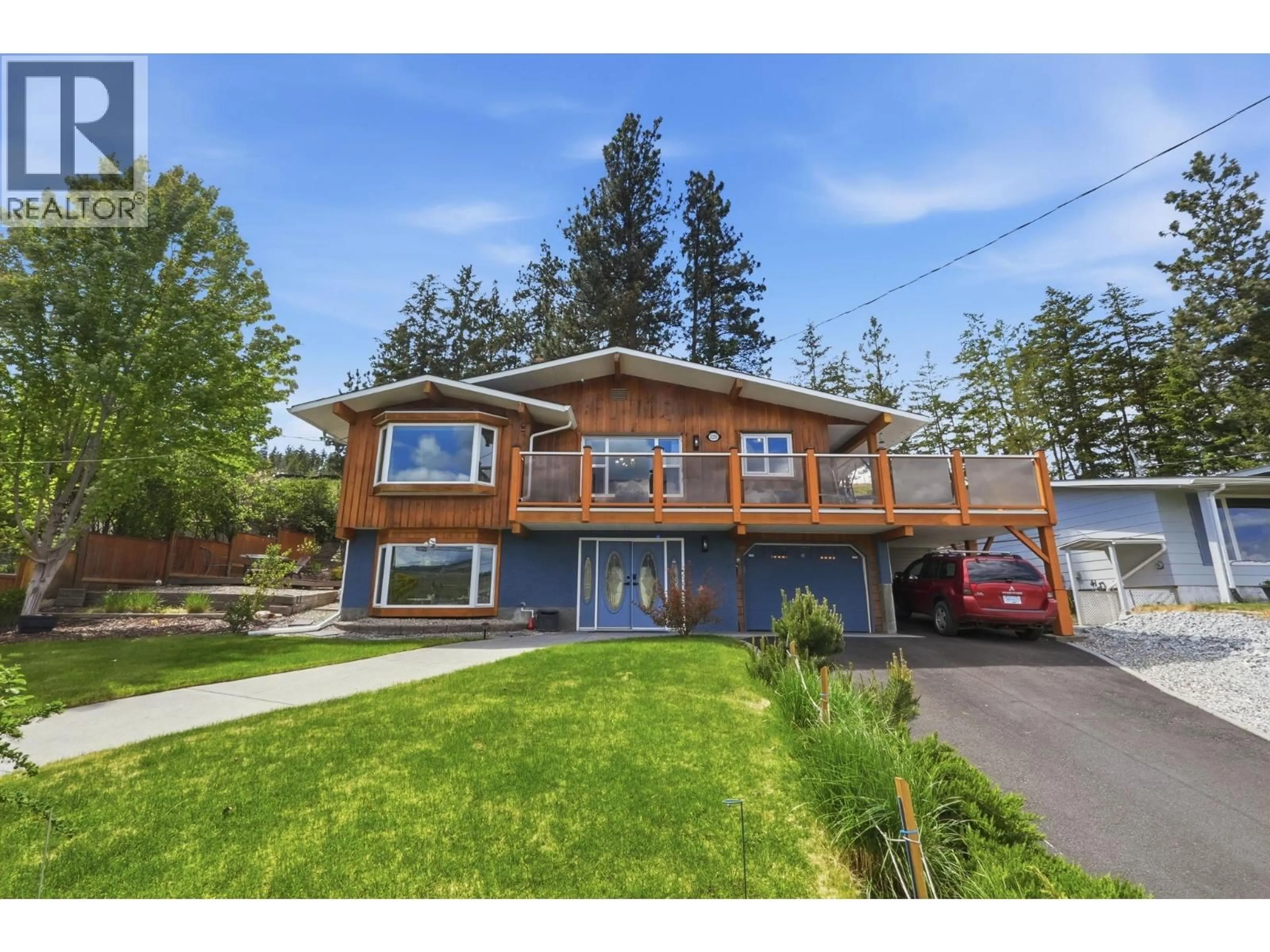 Home with vinyl exterior material, street for 2250 VERDE VISTA ROAD, Kelowna British Columbia V1X4K4