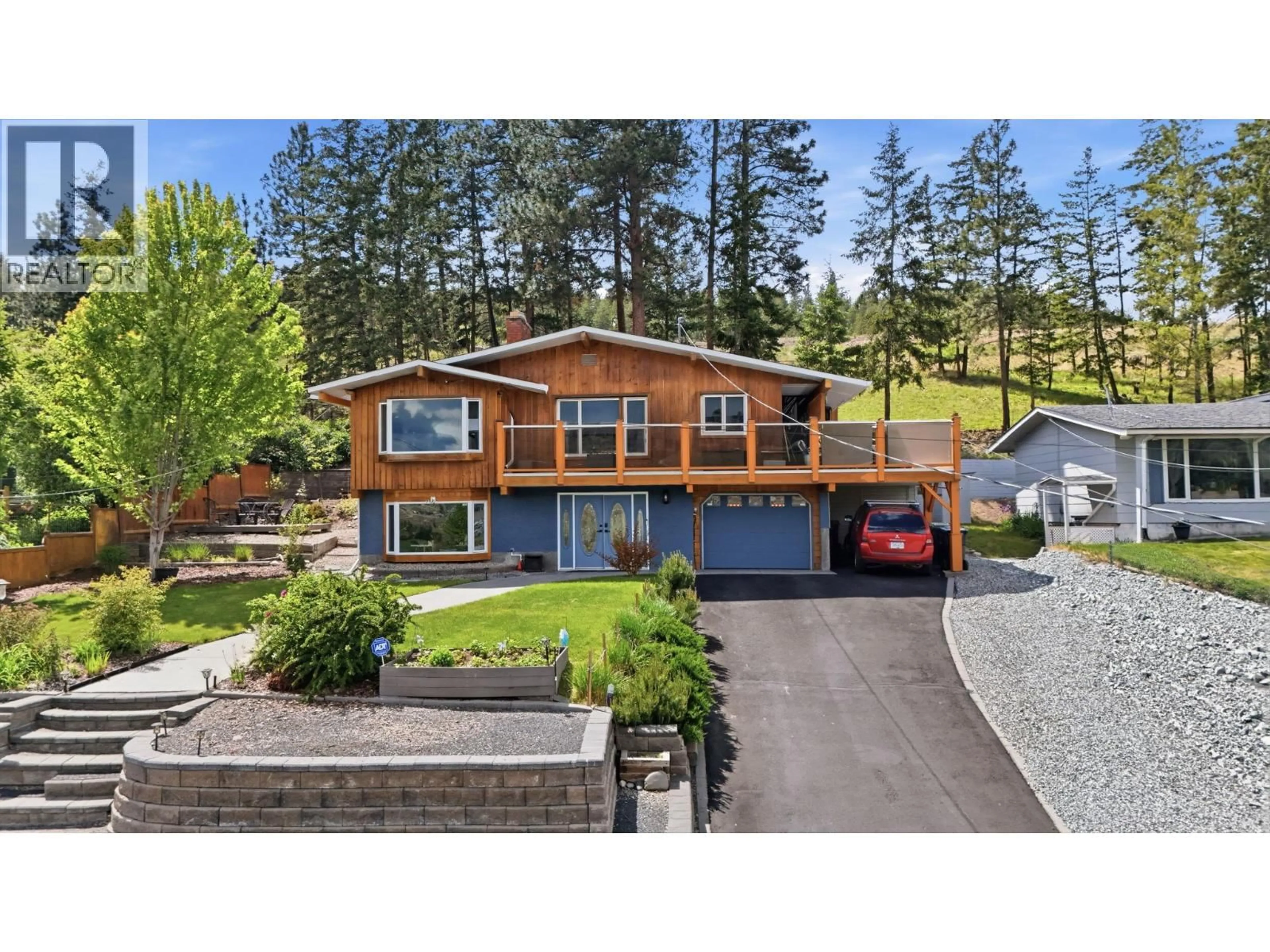 A pic from outside/outdoor area/front of a property/back of a property/a pic from drone, unknown for 2250 VERDE VISTA ROAD, Kelowna British Columbia V1X4K4