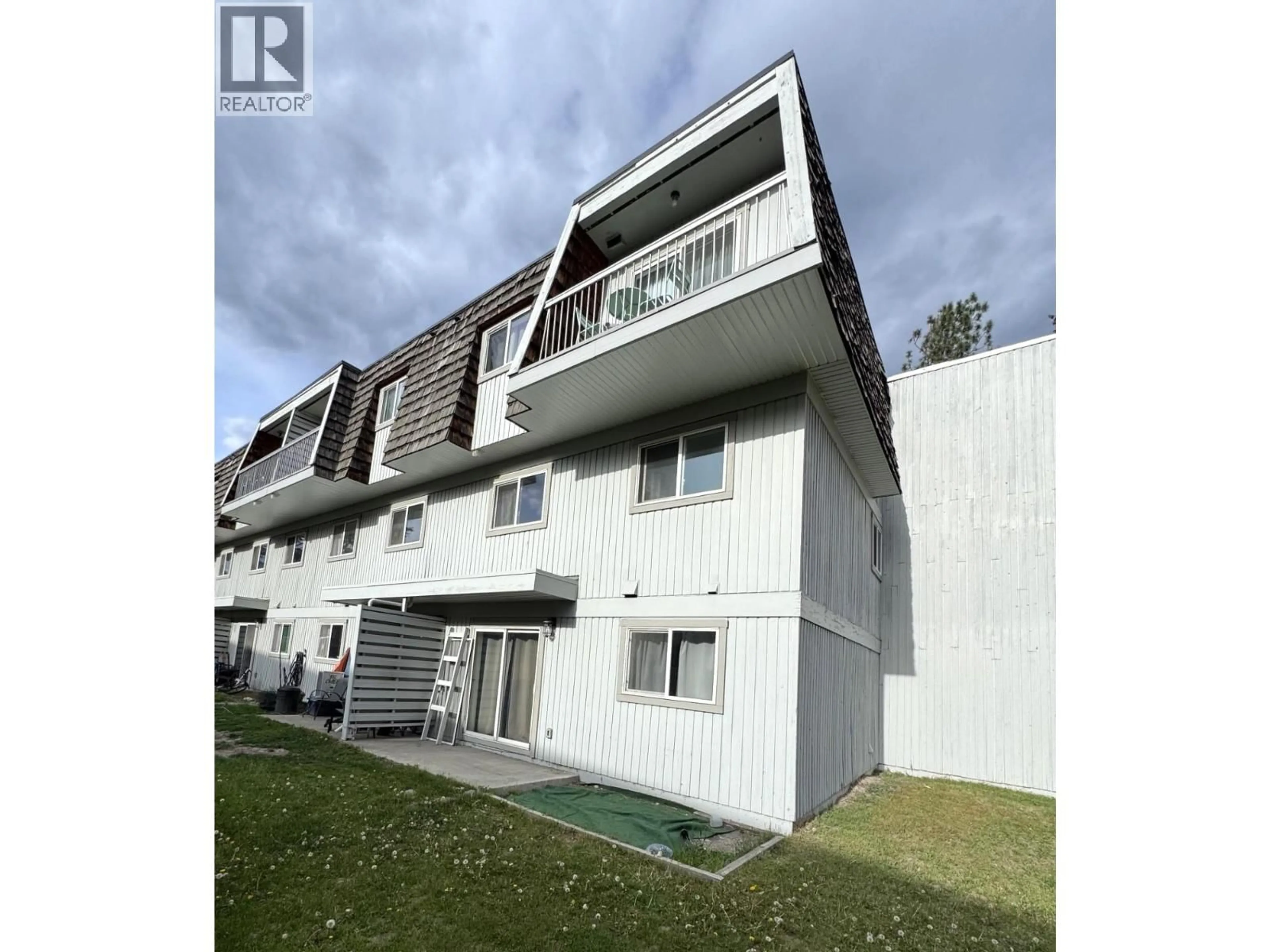 A pic from outside/outdoor area/front of a property/back of a property/a pic from drone, unknown for 102 - 2117 2ND STREET NORTH, Cranbrook British Columbia V1C3L4