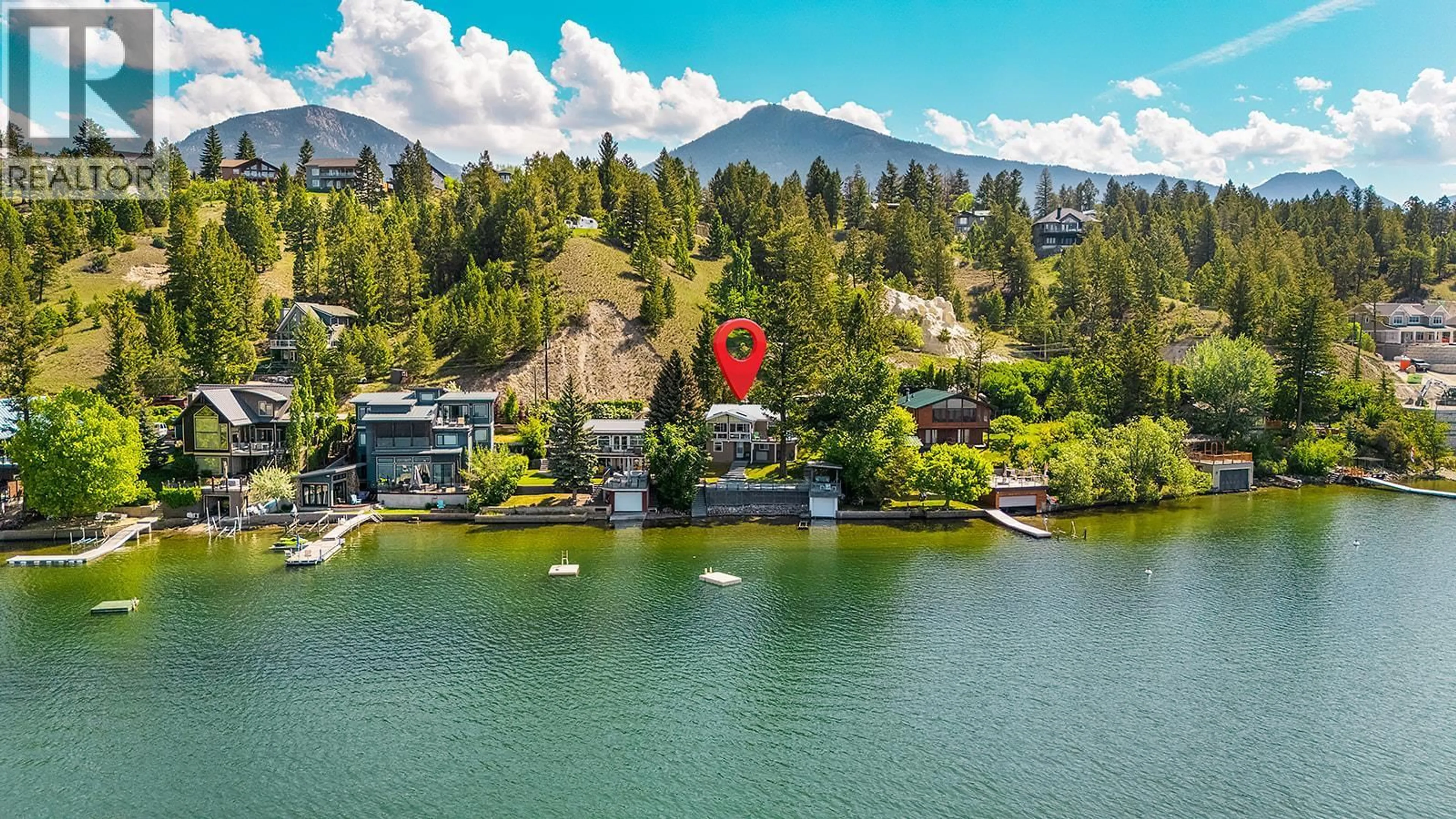 A pic from outside/outdoor area/front of a property/back of a property/a pic from drone, water/lake/river/ocean view for 695 LAKEVIEW ROAD, Invermere British Columbia V0A1K3