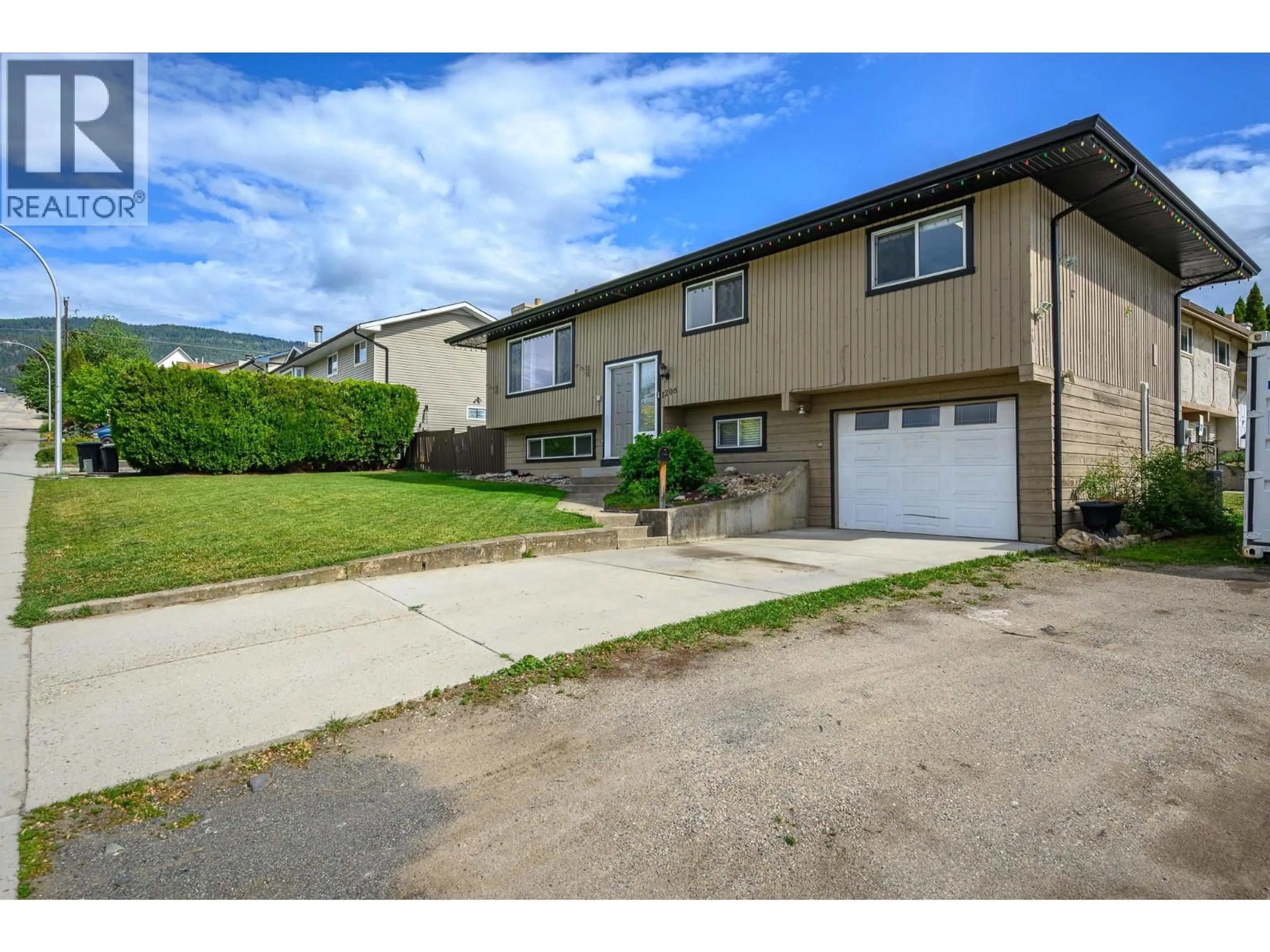 A pic from outside/outdoor area/front of a property/back of a property/a pic from drone, street for 1206 43 AVENUE, Vernon British Columbia V1T8C9