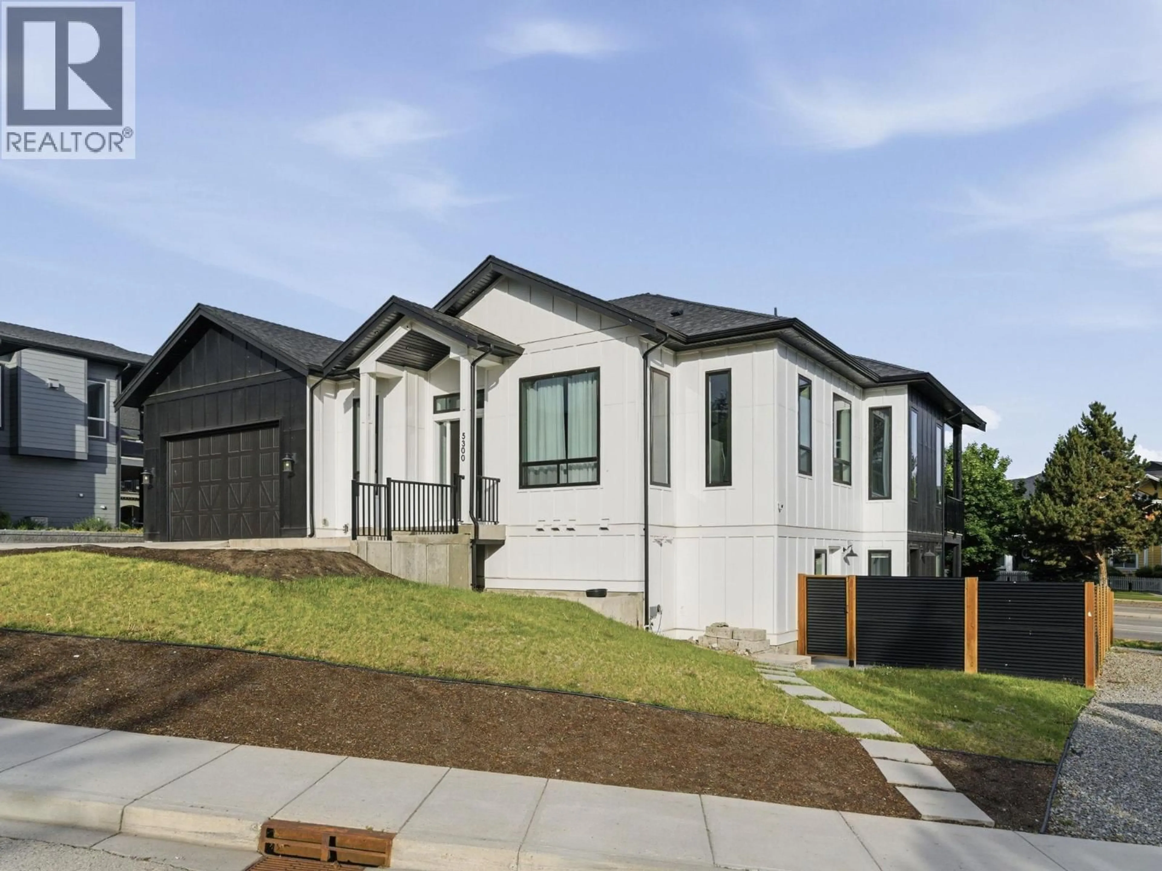 Home with brick exterior material, street for 5300 HEDEMAN COURT, Kelowna British Columbia V1W5A3