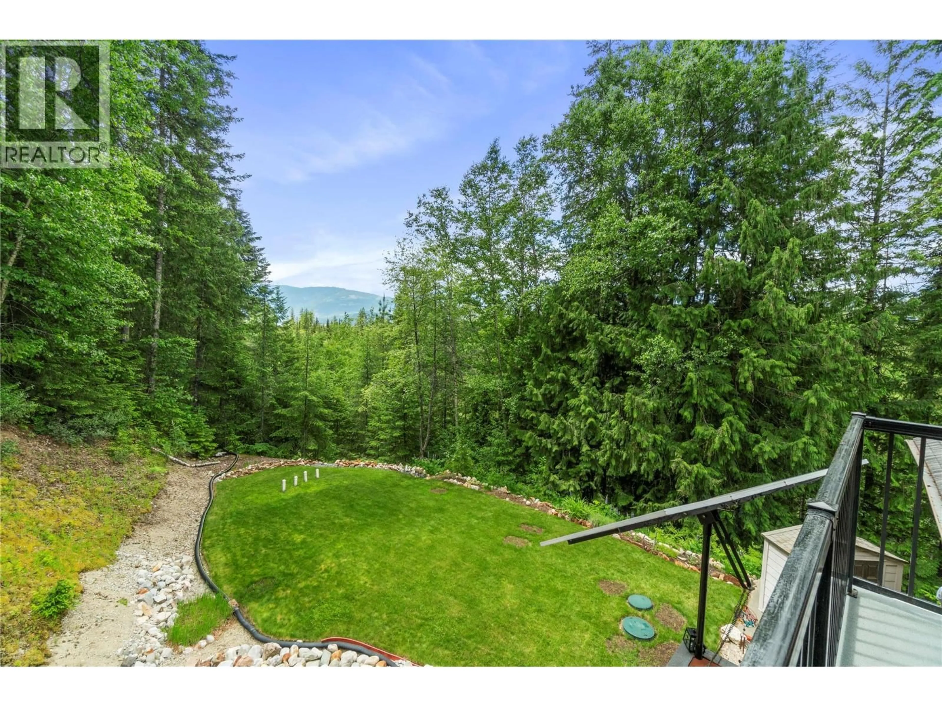 A pic from outside/outdoor area/front of a property/back of a property/a pic from drone, forest/trees view for 1372 SEYMOUR RIVER ROAD, Seymour Arm British Columbia V0E2V2
