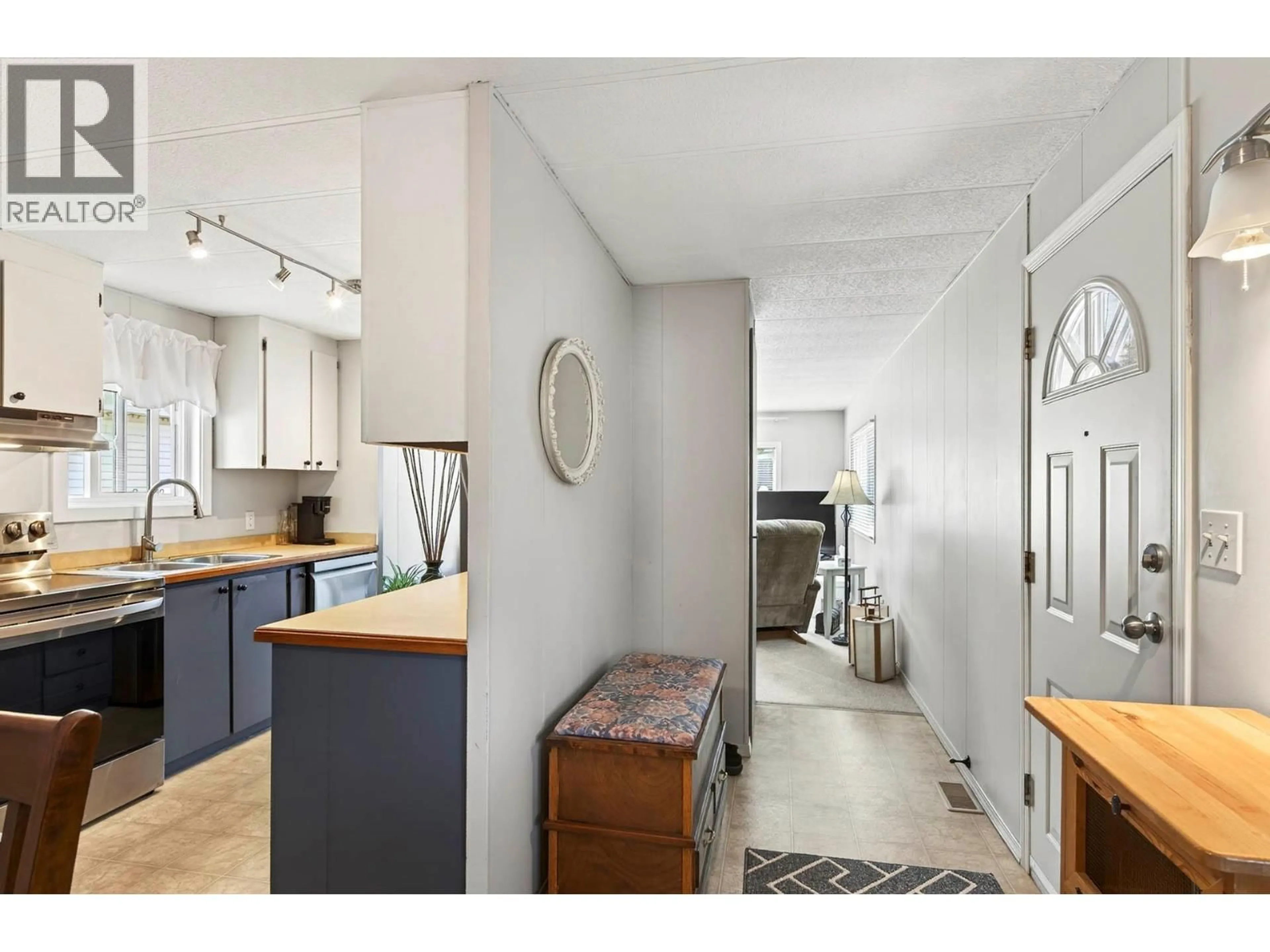 Open concept kitchen, unknown for 109 - 2401 ORD ROAD, Kamloops British Columbia V2B7V8