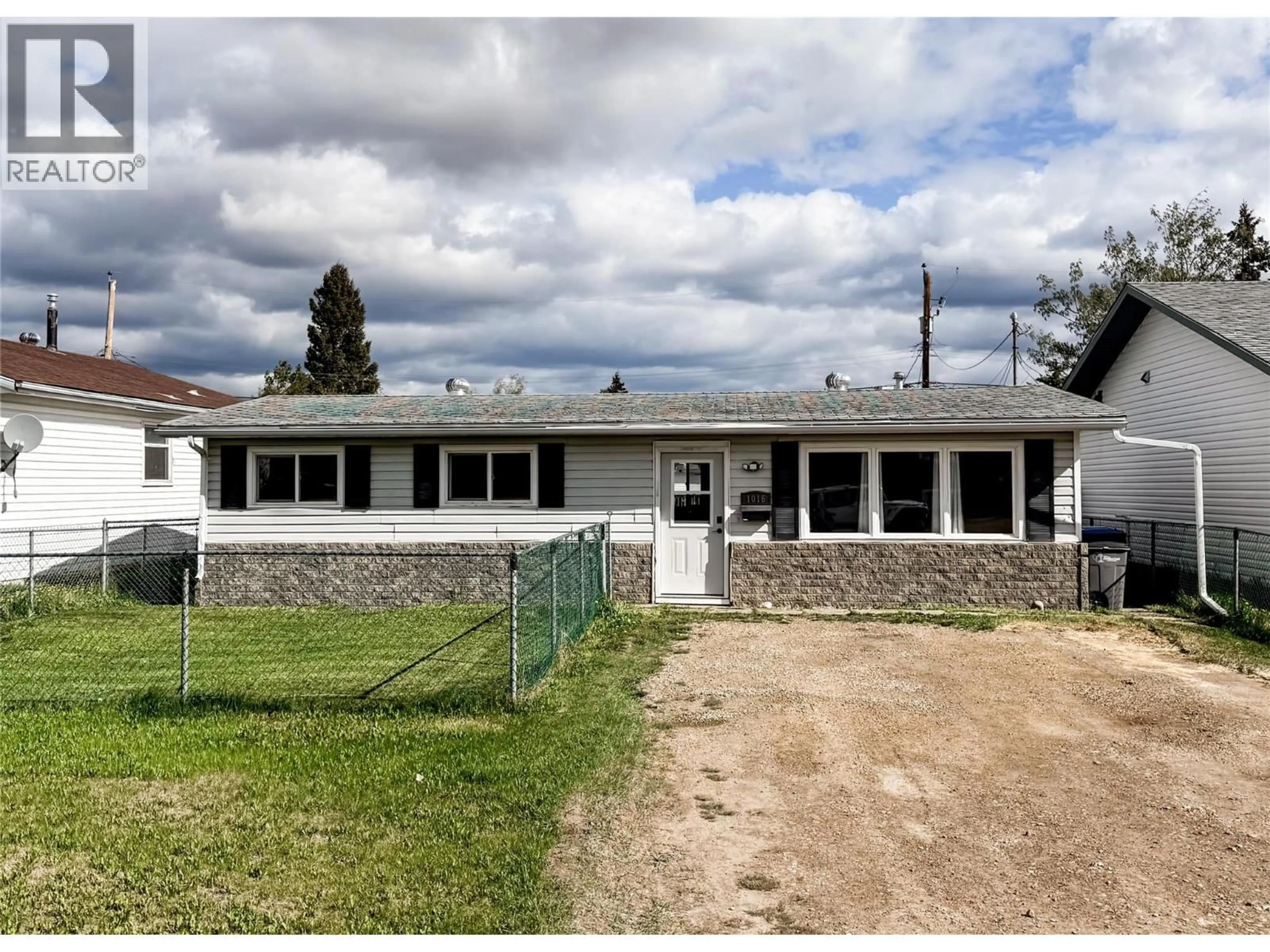 A pic from outside/outdoor area/front of a property/back of a property/a pic from drone, building for 1016 120 AVENUE, Dawson Creek British Columbia V1G3J7