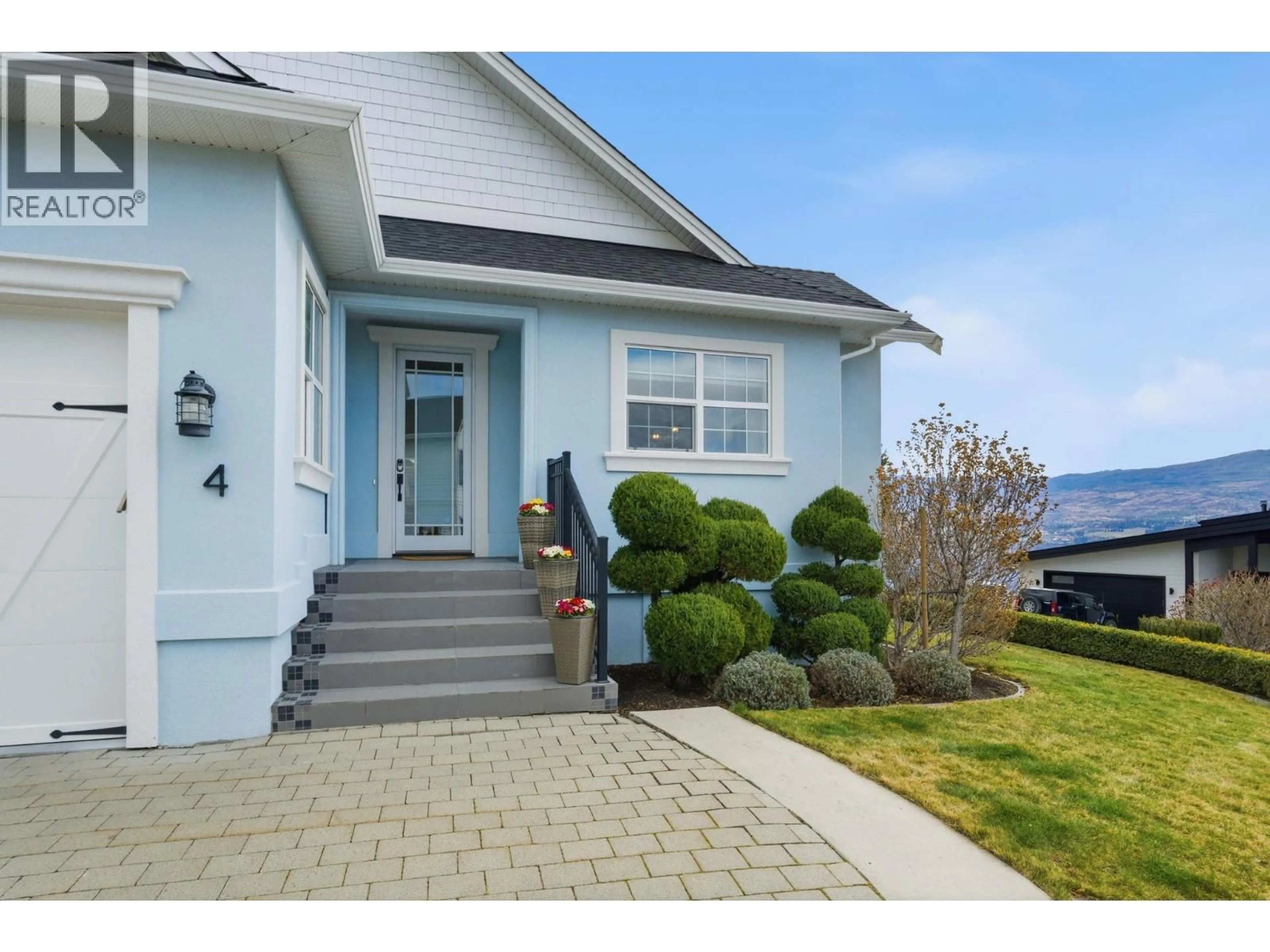 Home with vinyl exterior material, street for 4 - 3121 THACKER DRIVE, West Kelowna British Columbia V1Z1X6