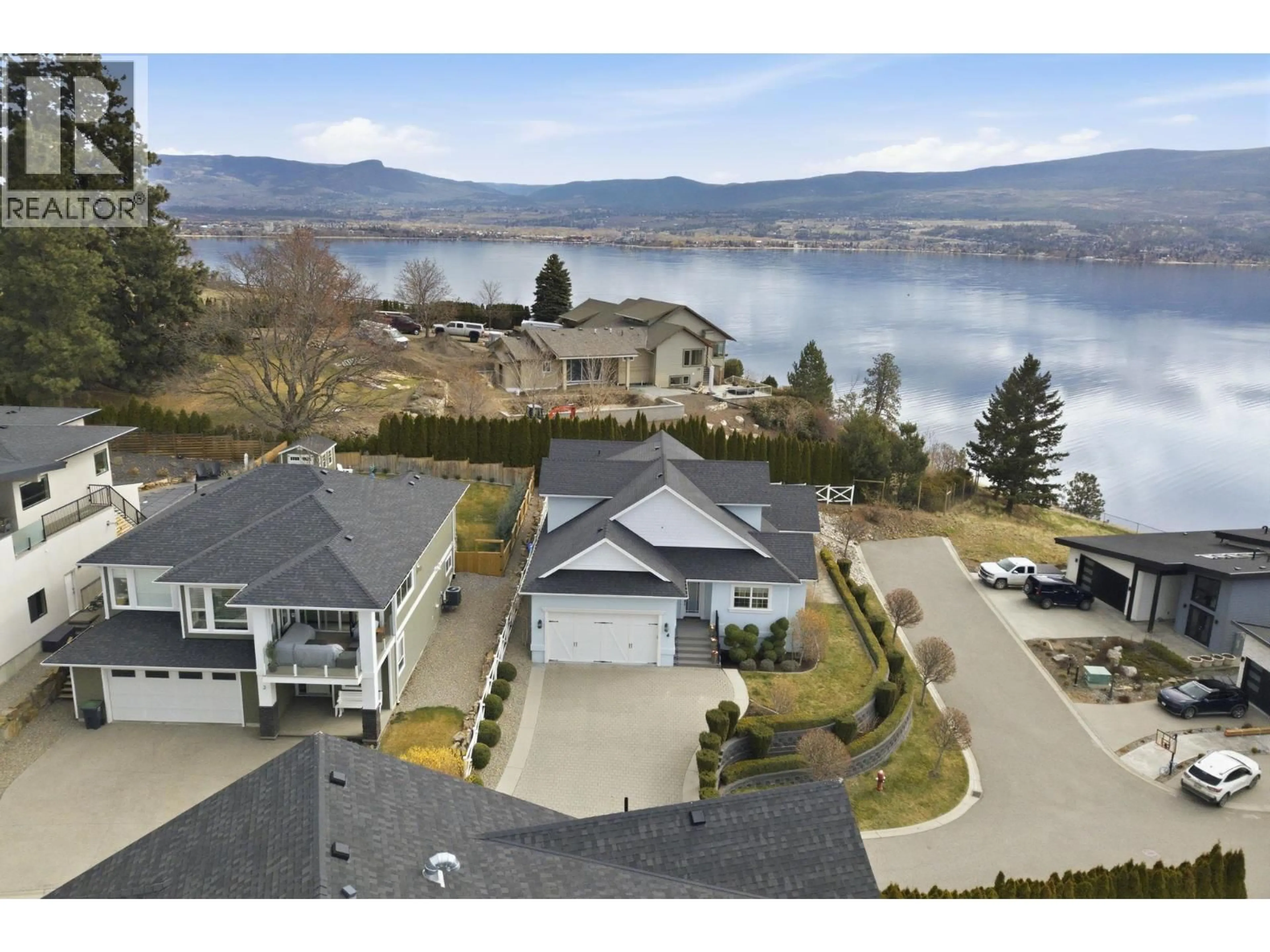 A pic from outside/outdoor area/front of a property/back of a property/a pic from drone, water/lake/river/ocean view for 4 - 3121 THACKER DRIVE, West Kelowna British Columbia V1Z1X6