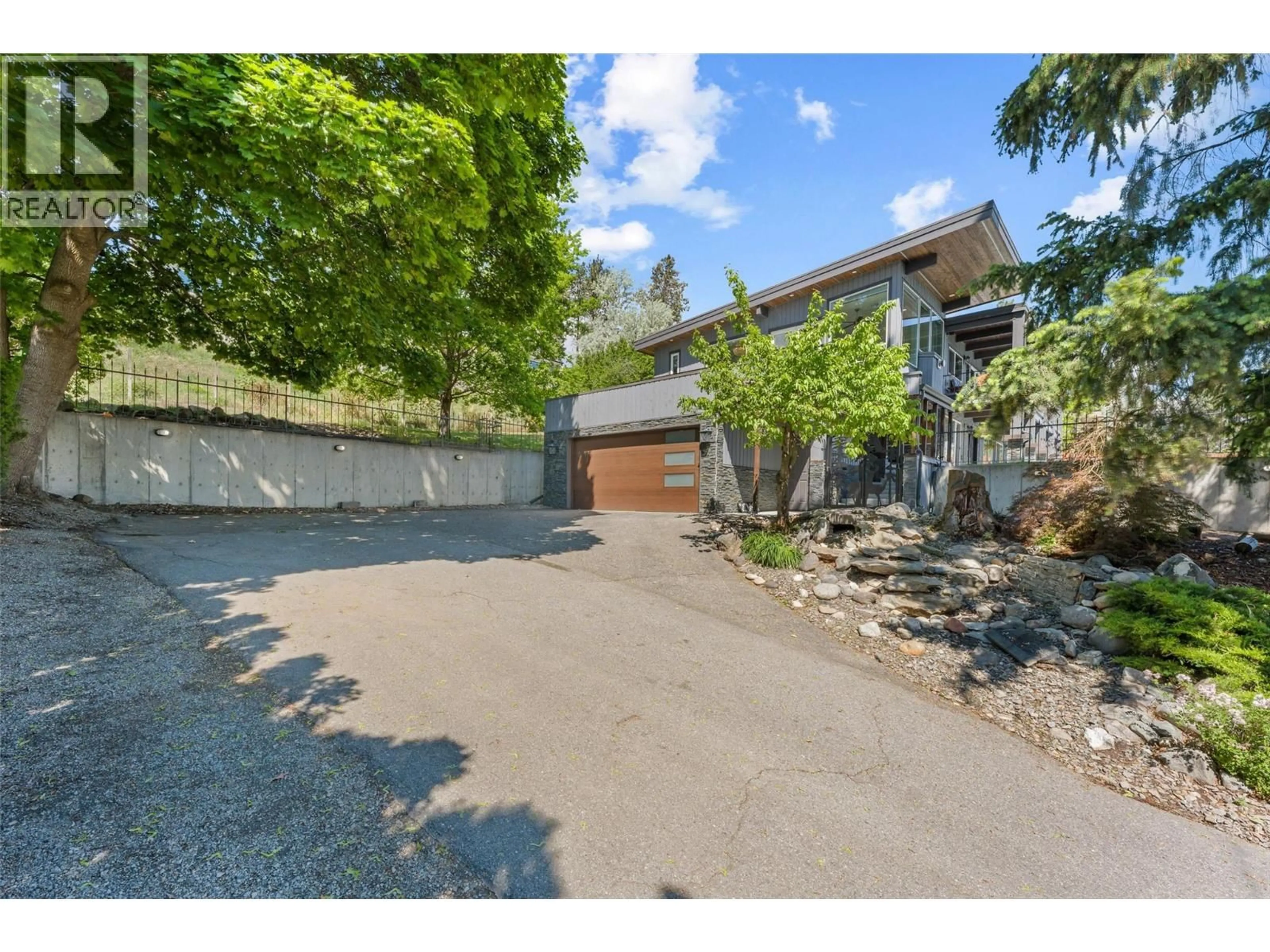 A pic from outside/outdoor area/front of a property/back of a property/a pic from drone, street for 2740 LAKEVIEW ROAD, West Kelowna British Columbia V1Z1Y4