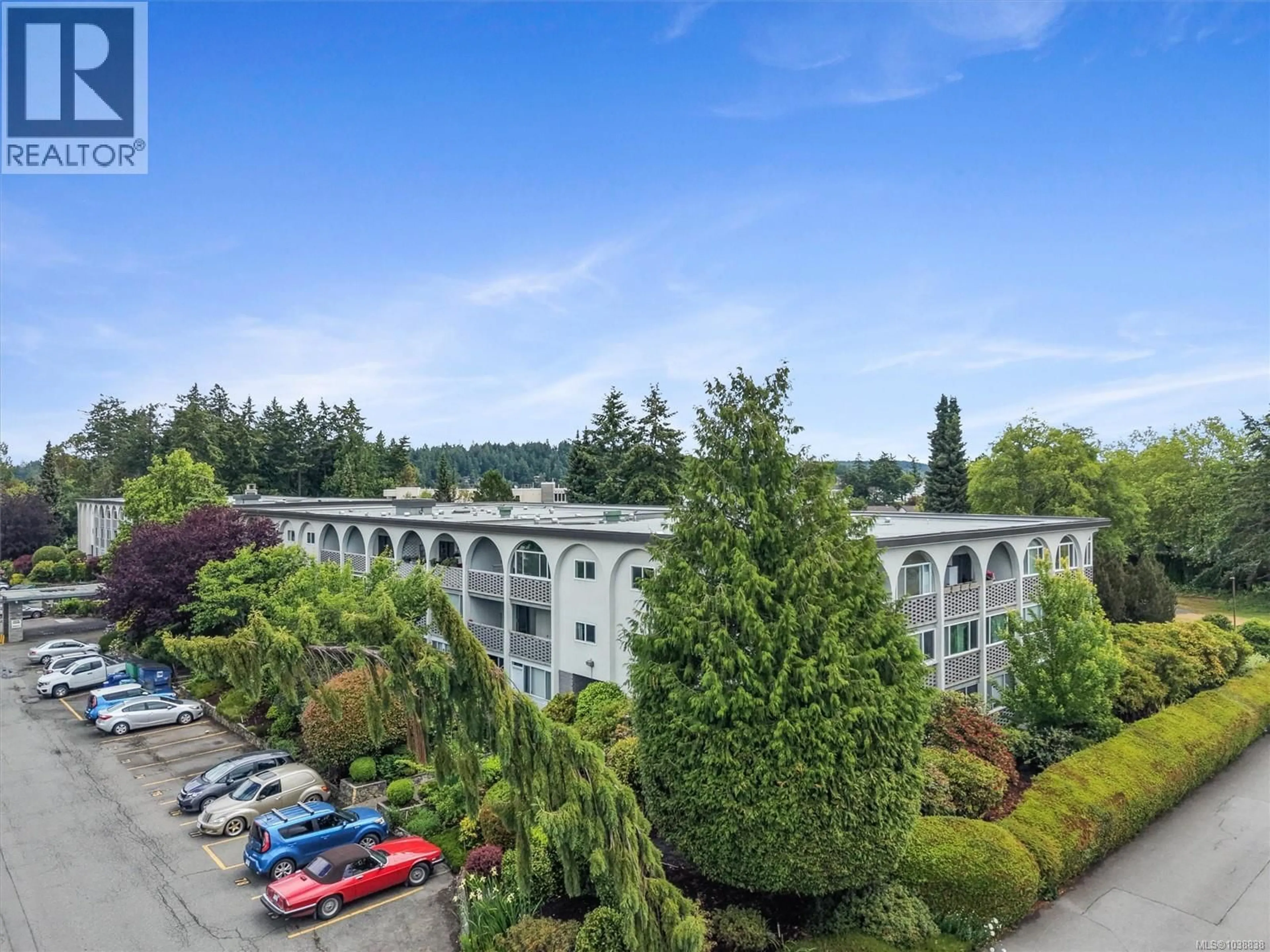 A pic from outside/outdoor area/front of a property/back of a property/a pic from drone, unknown for 205 - 2040 WHITE BIRCH ROAD, Sidney British Columbia V8L2R1