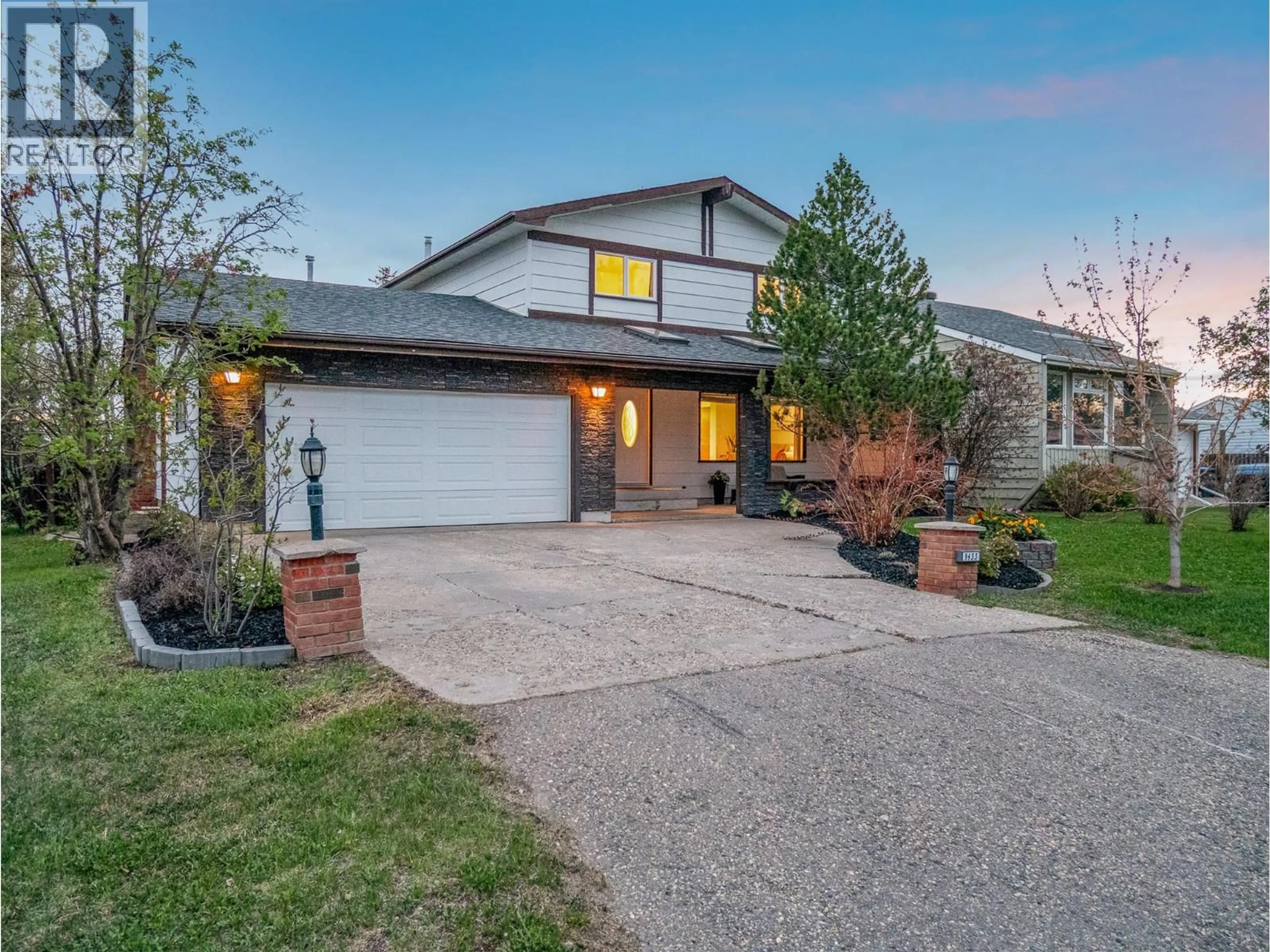 Home with brick exterior material, street for 9433 7 STREET, Dawson Creek British Columbia V1G3M7